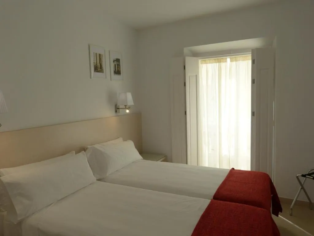 Bed in Hotel Apartamentos Patagonia Sur