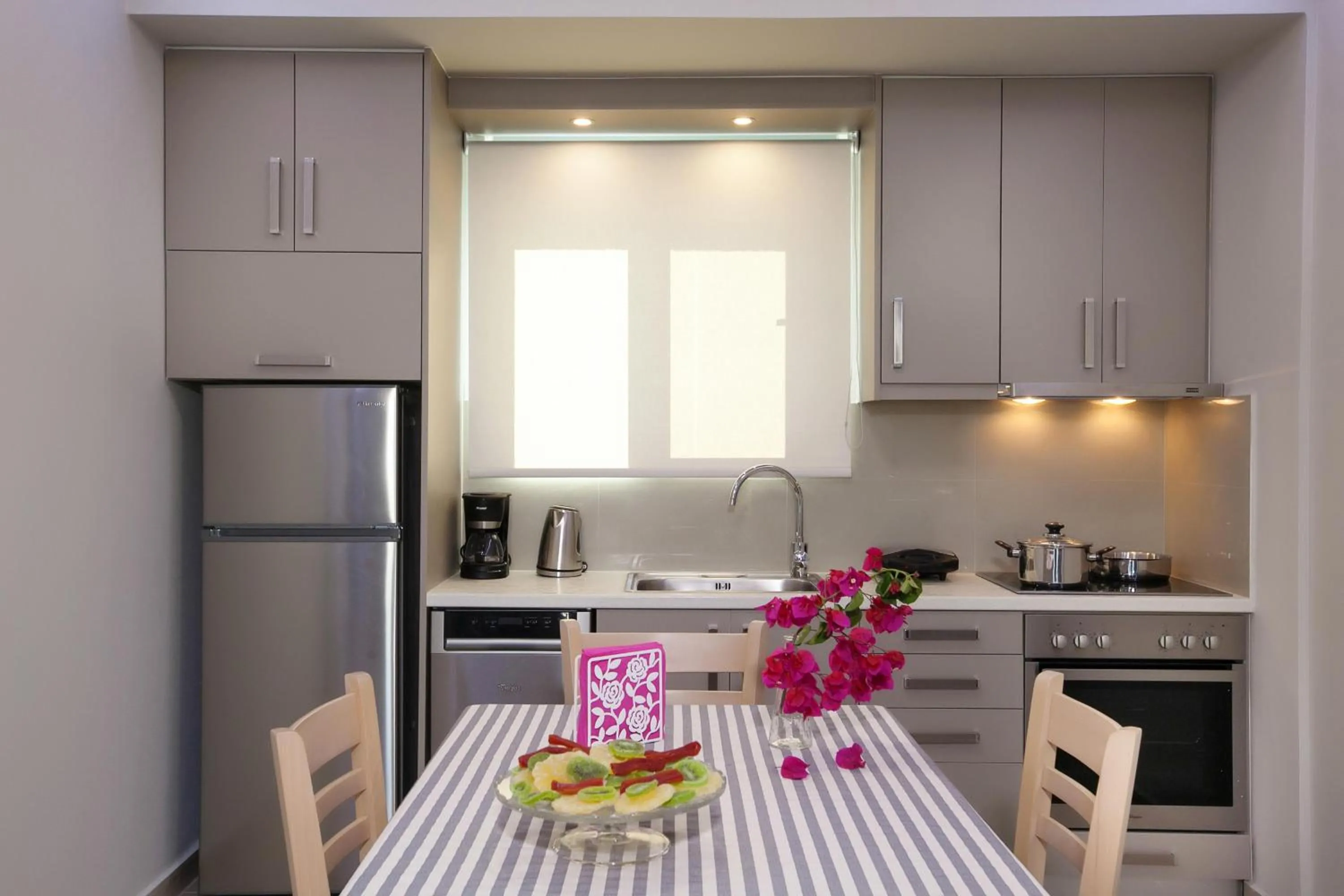 Communal kitchen in Zante Suites