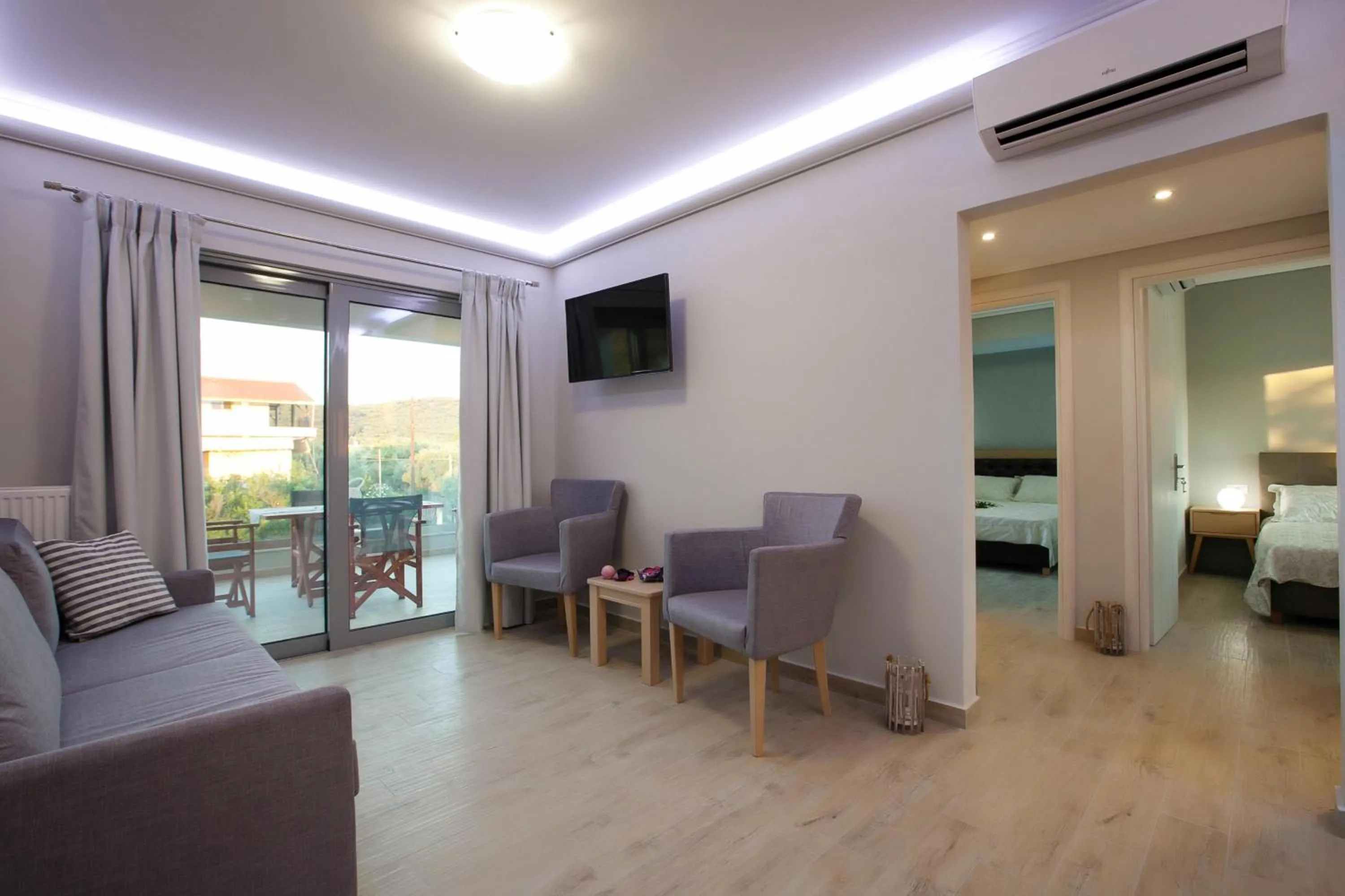 Living room, Bed in Zante Suites