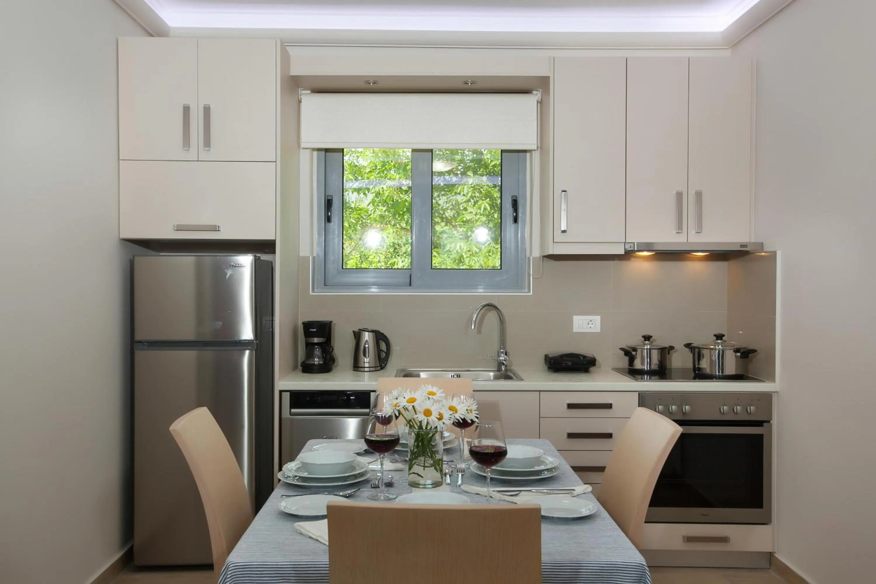 Kitchen or kitchenette in Zante Suites