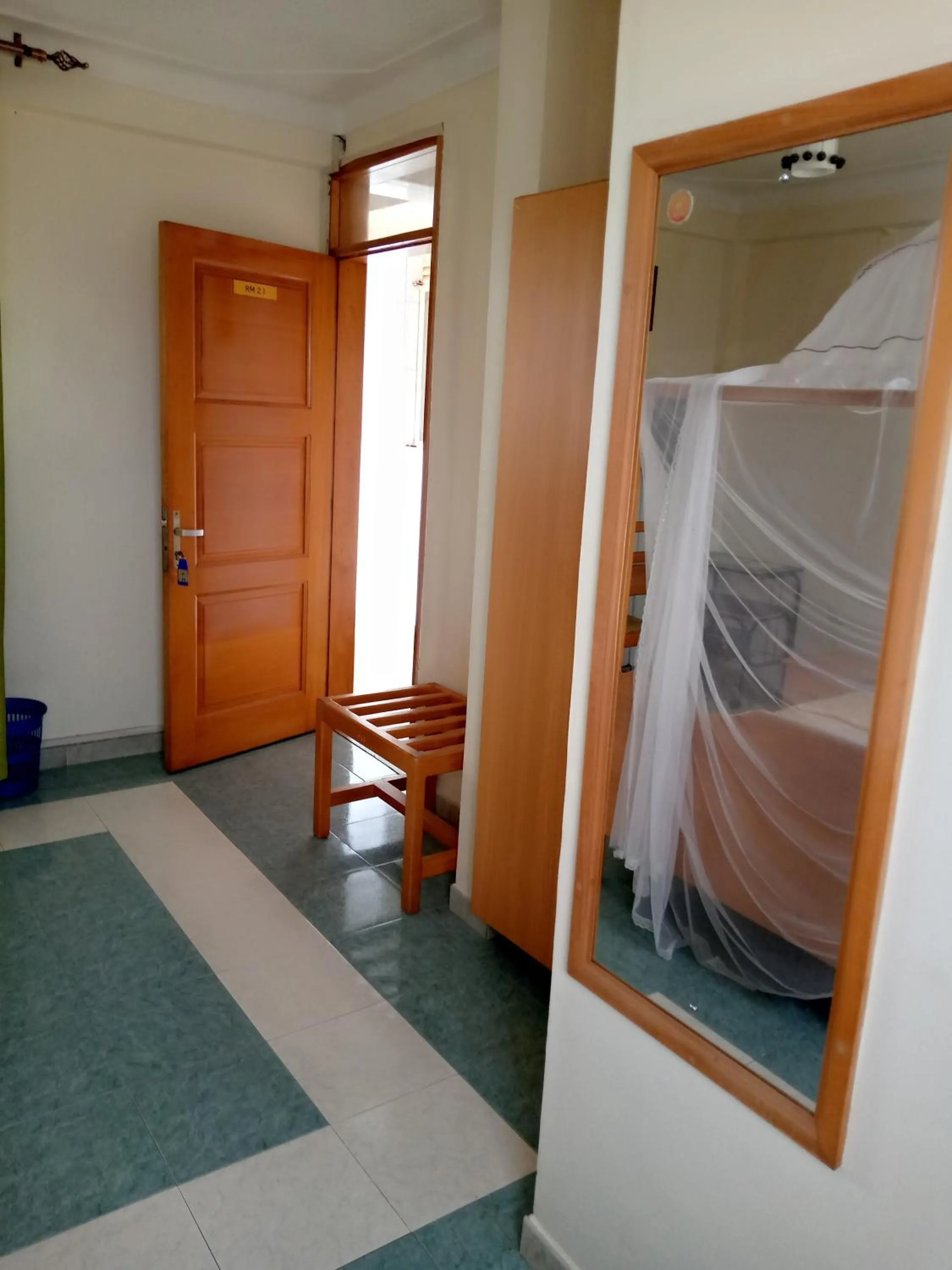 Bed in Palm Springs Hotel Masaka