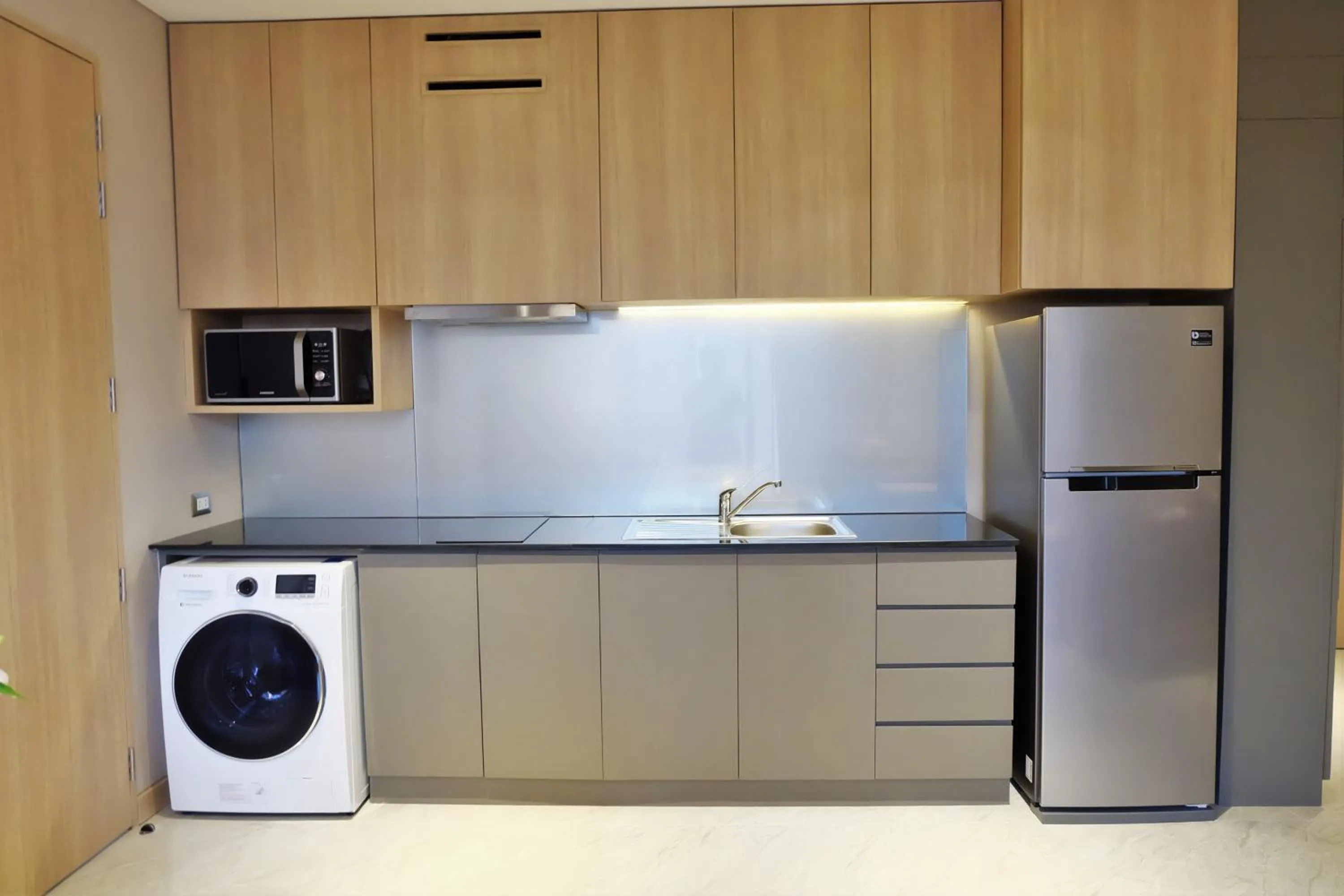 Kitchen or kitchenette in SKYVIEW Hotel Bangkok - Sukhumvit