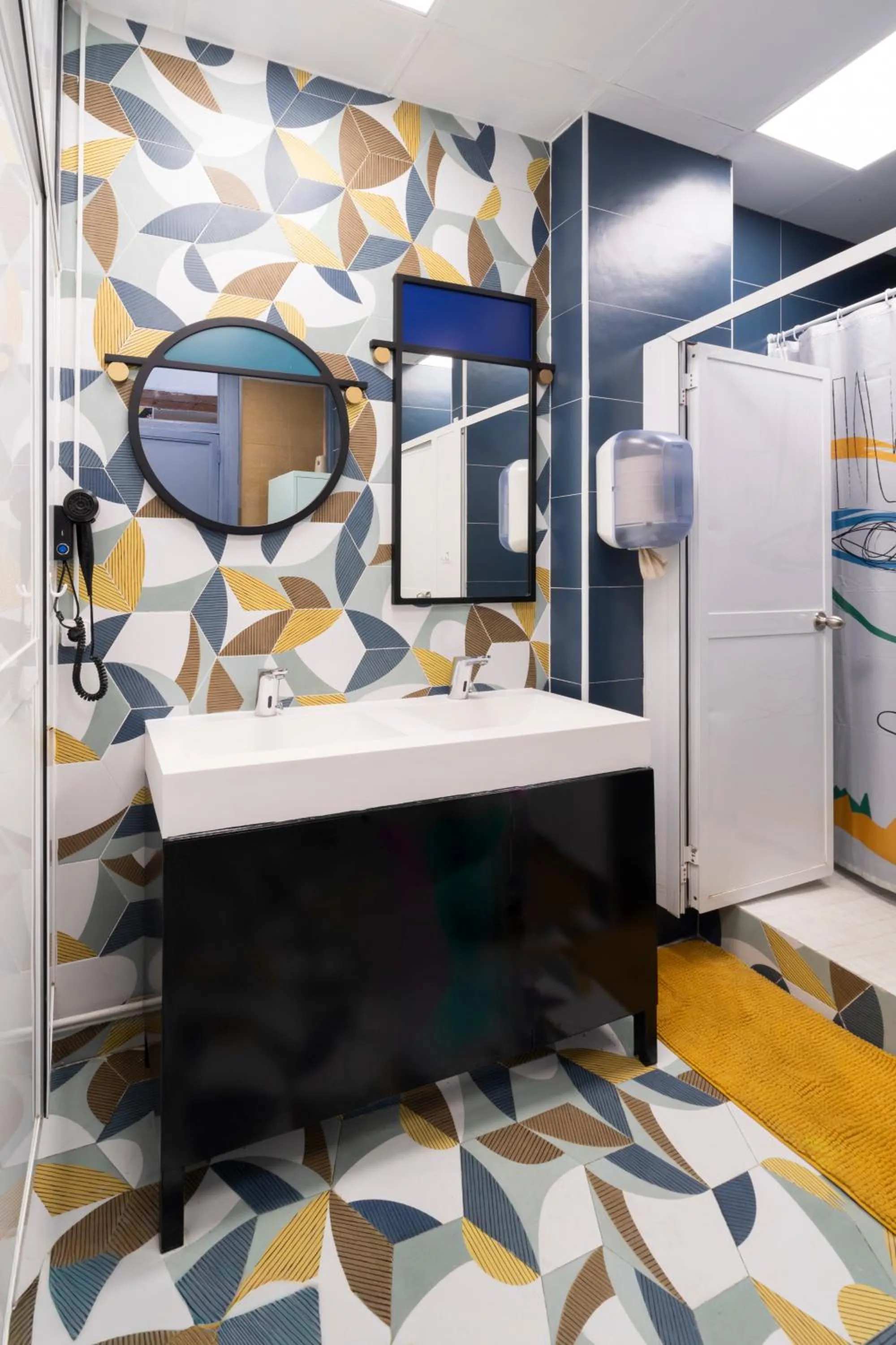 Bathroom in Home Youth Hostel by Feetup Hostels