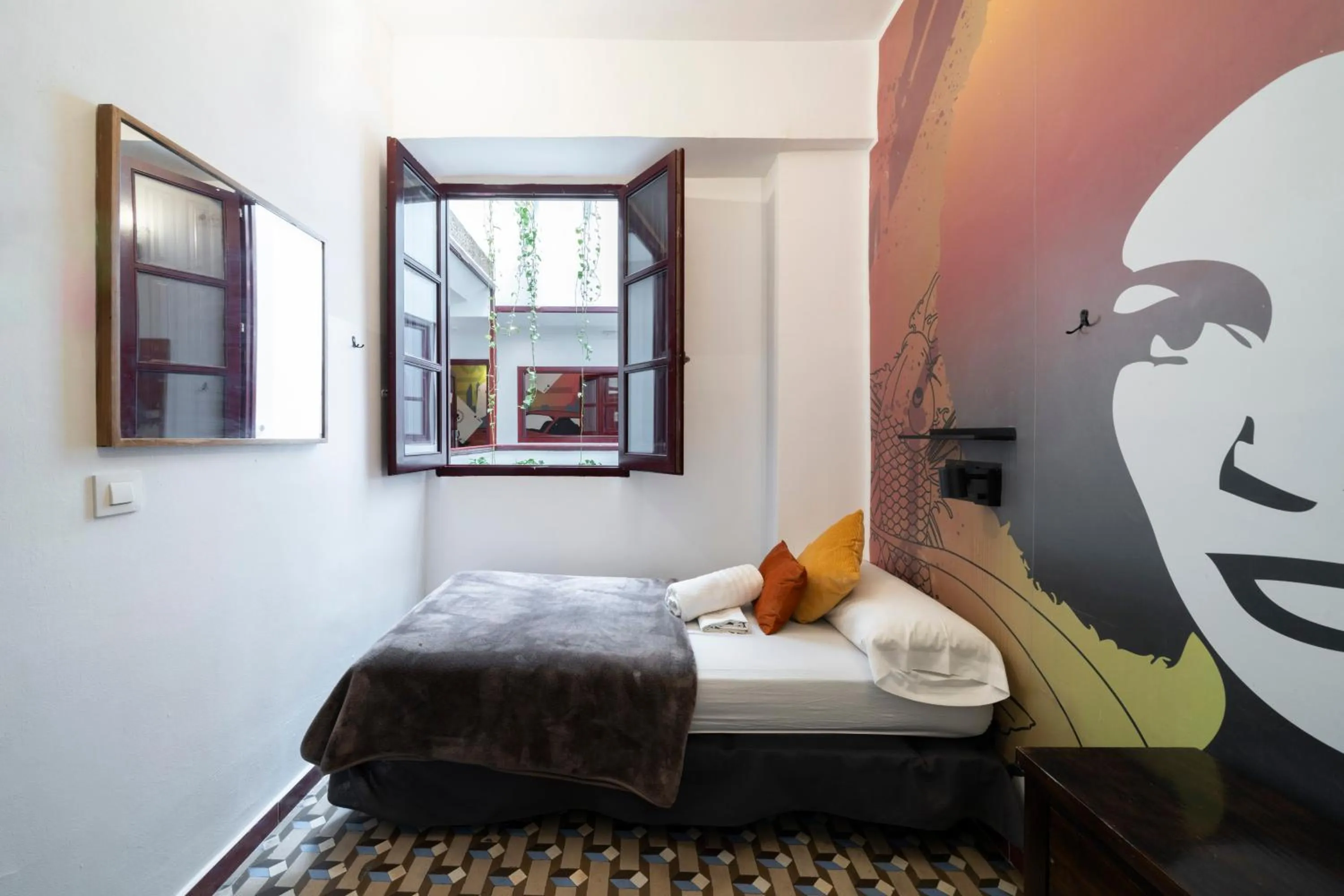 Bed in Home Youth Hostel by Feetup Hostels