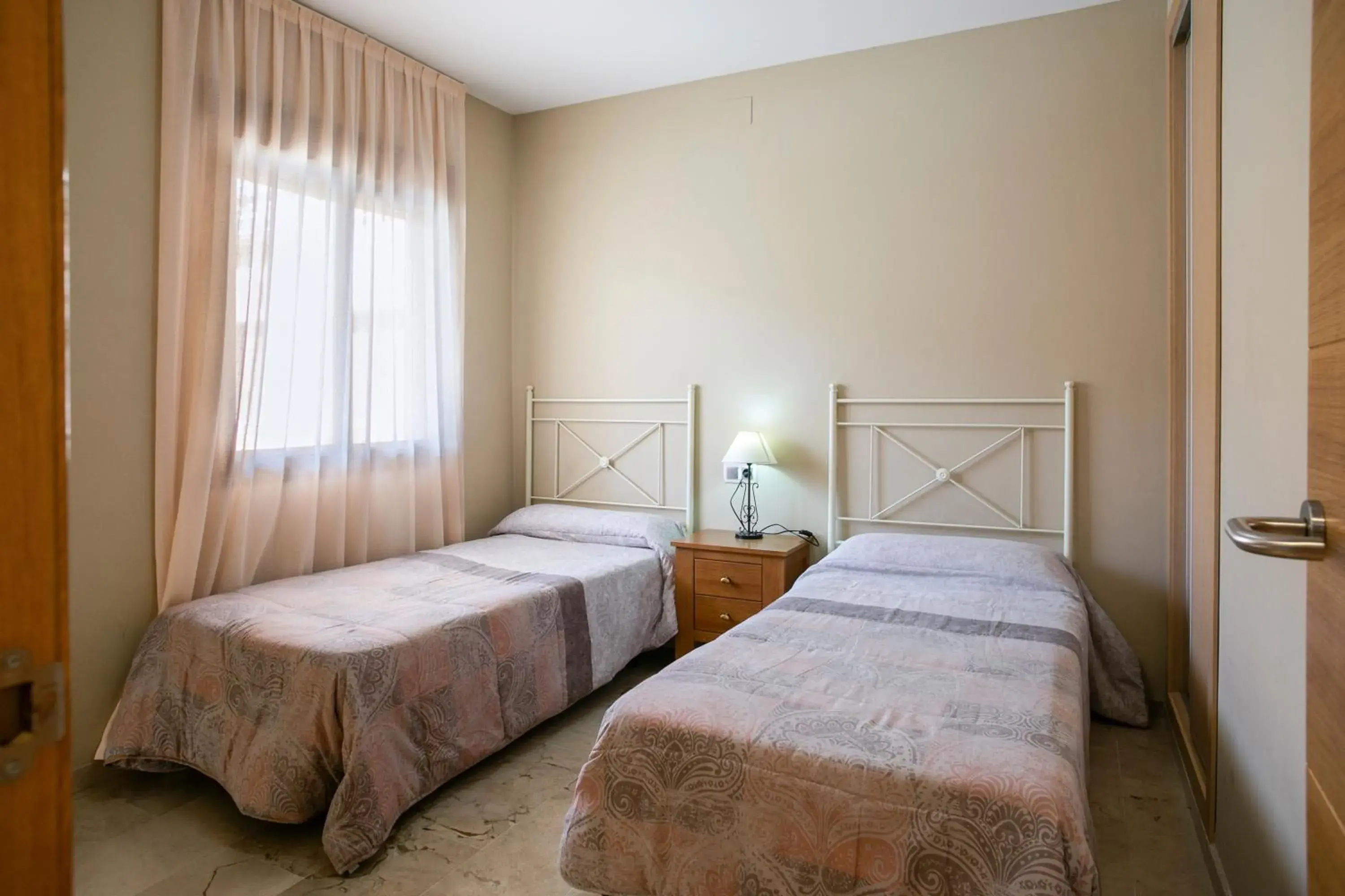 Bedroom, Bed in Apartamentos Turísticos La Castilleja Bedroom, Bed in Apartamentos Turísticos La Castilleja