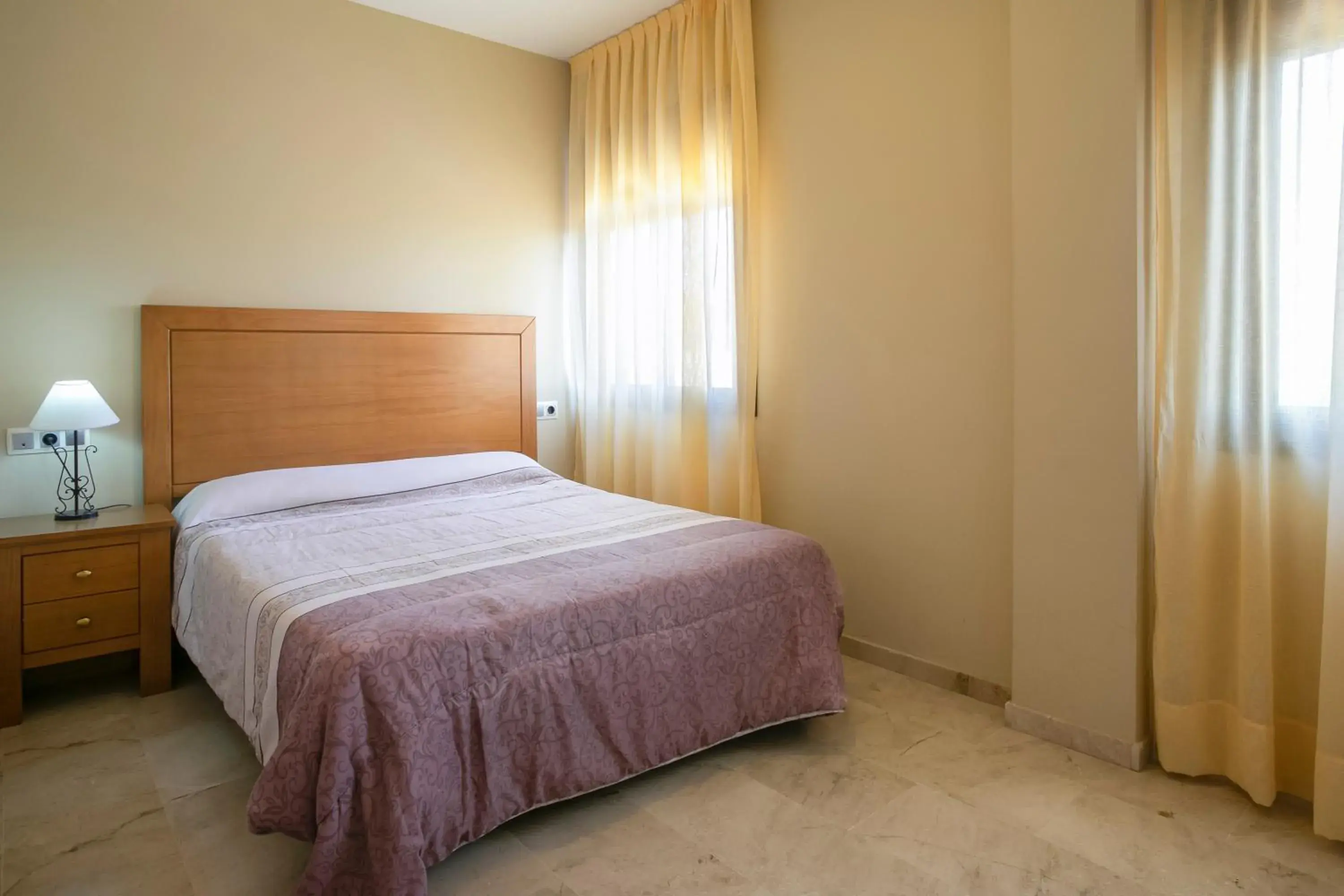 Bedroom, Bed in Apartamentos Turísticos La Castilleja Bedroom, Bed in Apartamentos Turísticos La Castilleja