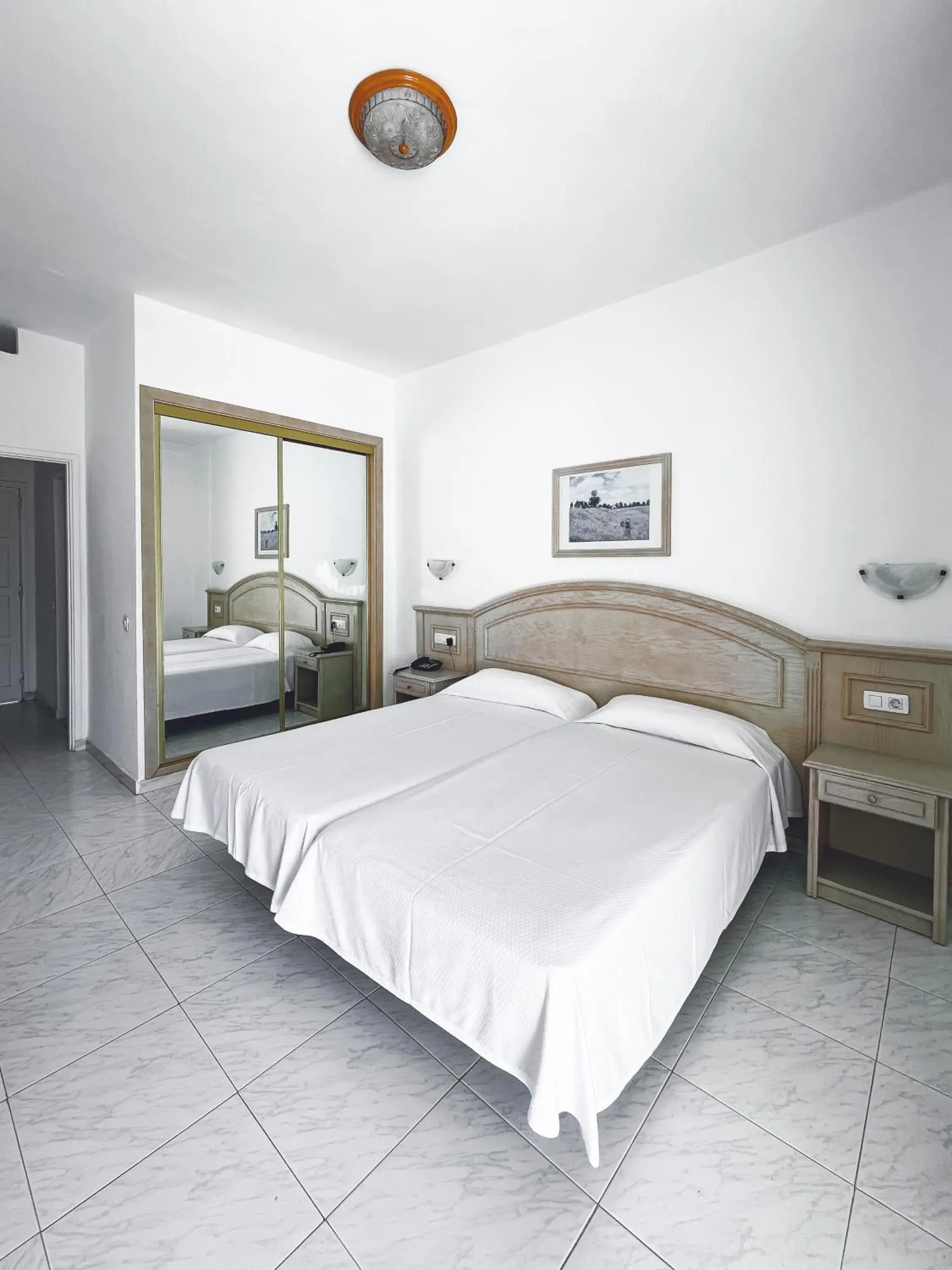 Bedroom, Bed in Apartamentos La Carabela Bedroom, Bed in Apartamentos La Carabela