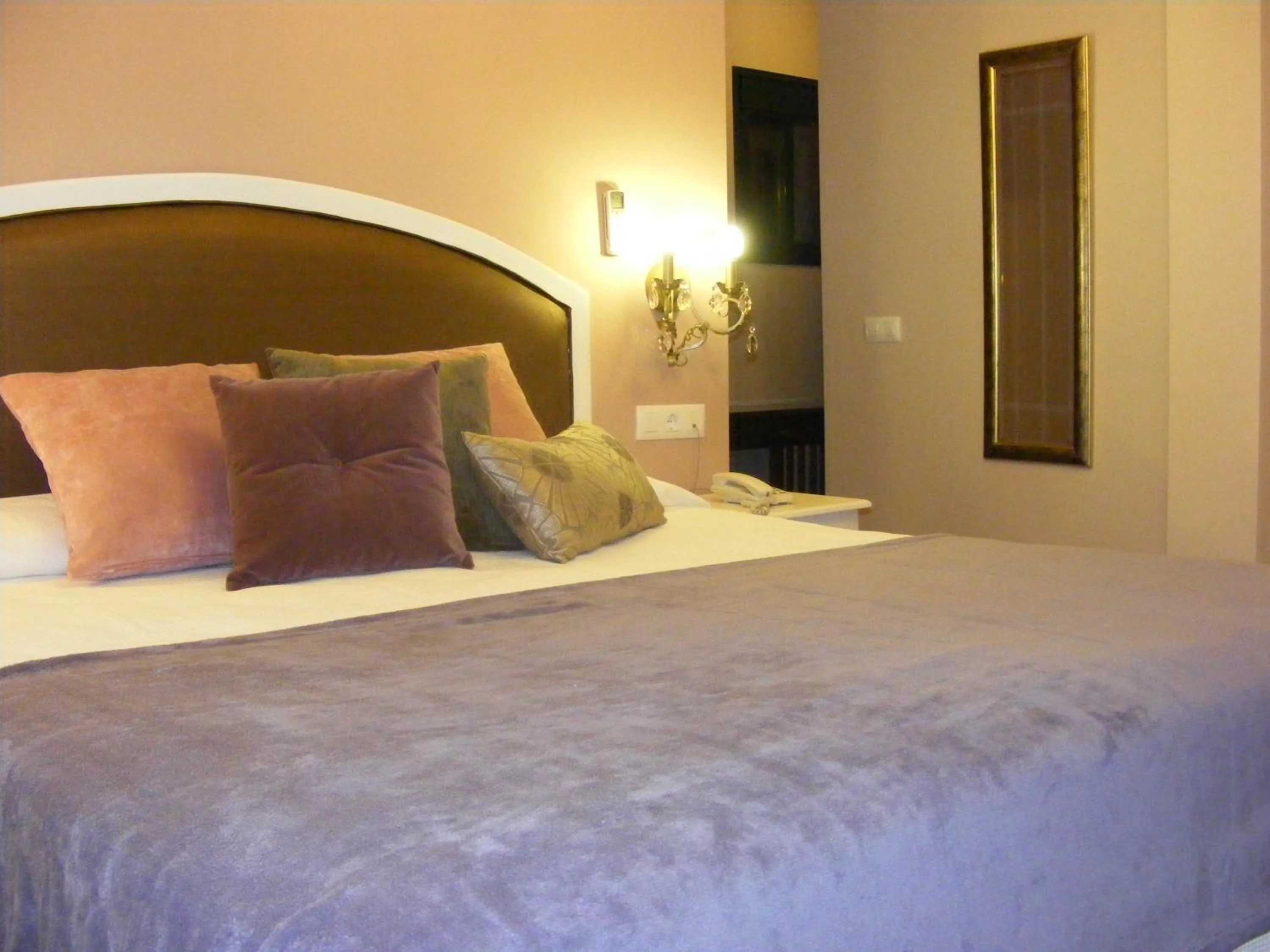 Bed in Hotel Sindhura