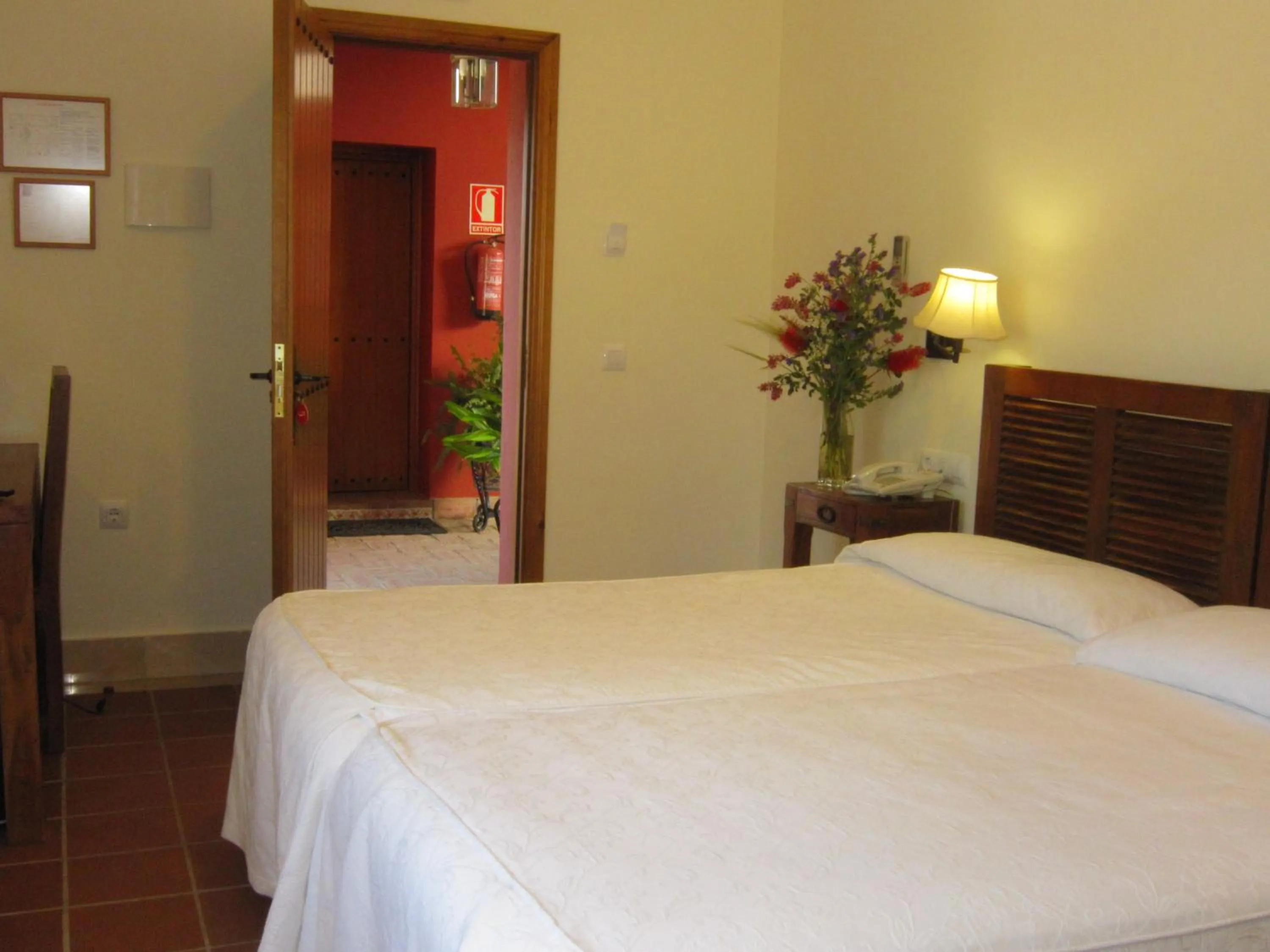 Bed in Hotel Sindhura