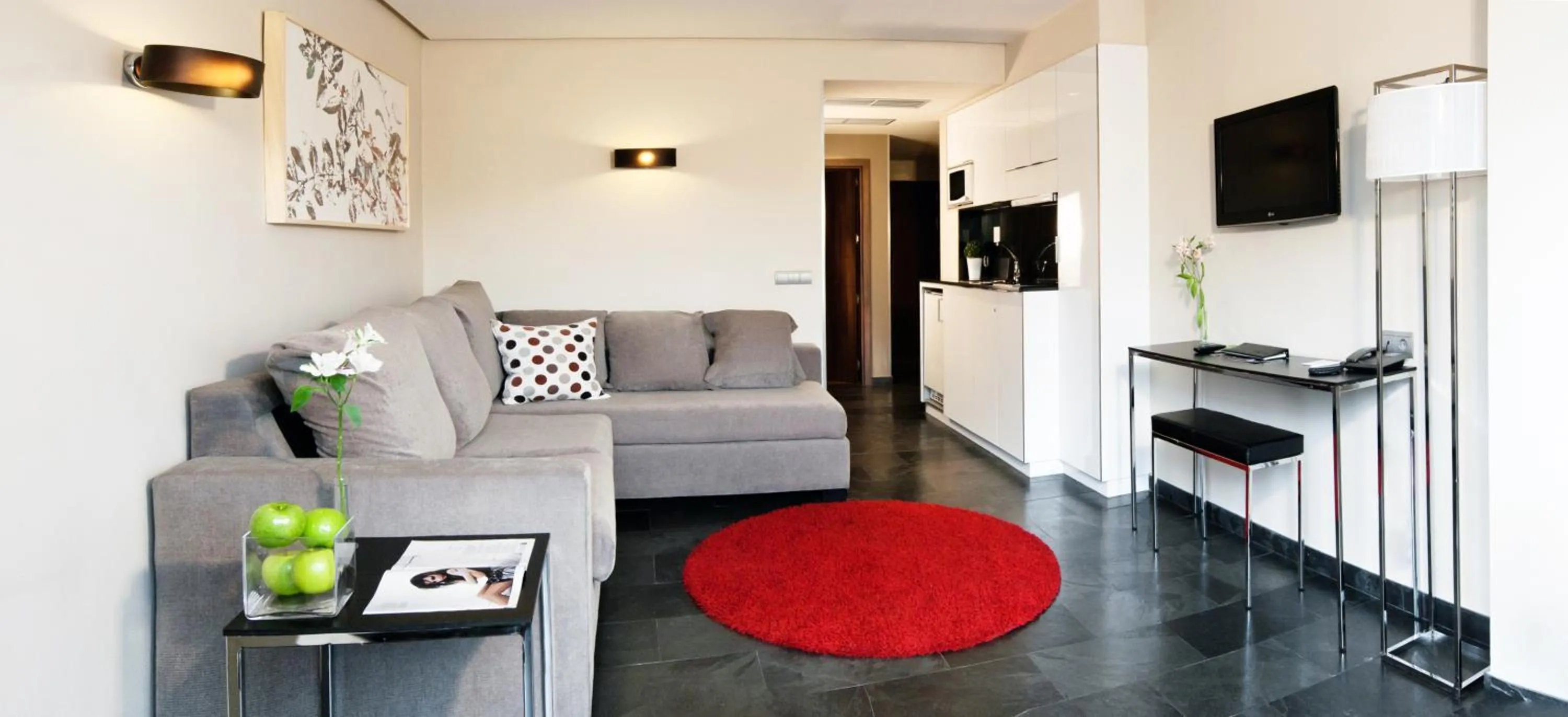 Living room in Apartosuites Jardines de Sabatini