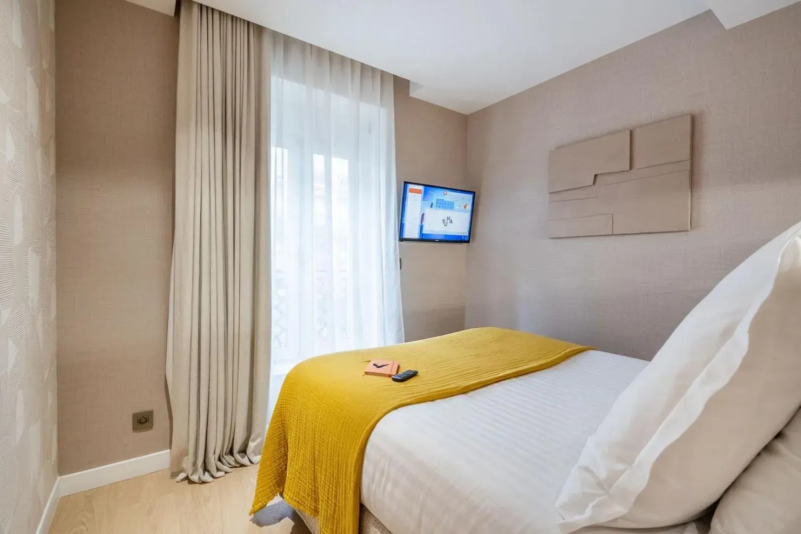Bed in Yuna Les Halles - Serviced Apartments Bed in Yuna Les Halles - Serviced Apartments