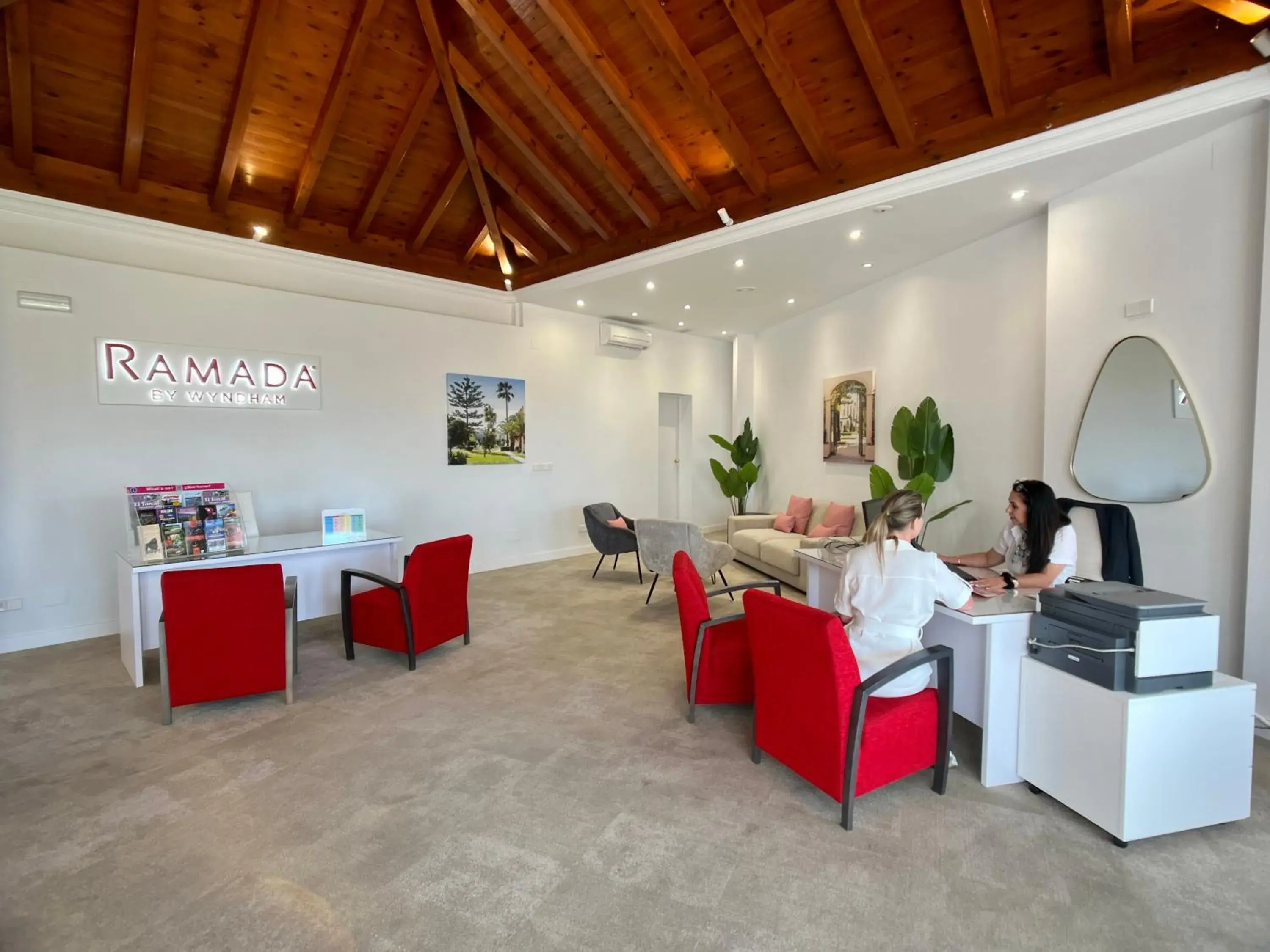 Lobby or reception in Ramada Hotel & Suites by Wyndham Costa del Sol Lobby or reception in Ramada Hotel & Suites by Wyndham Costa del Sol