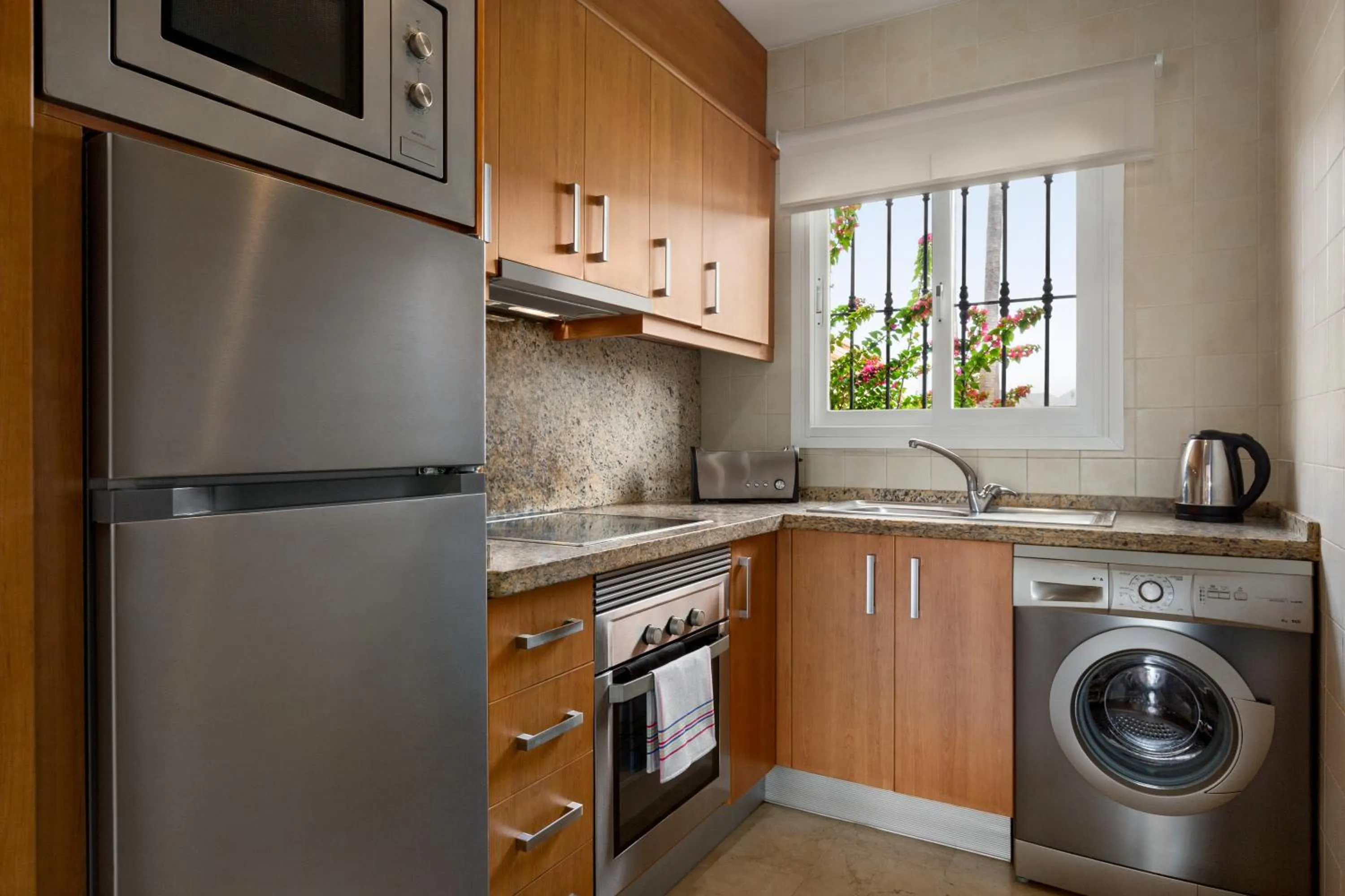 kitchen in Ramada Hotel & Suites by Wyndham Costa del Sol