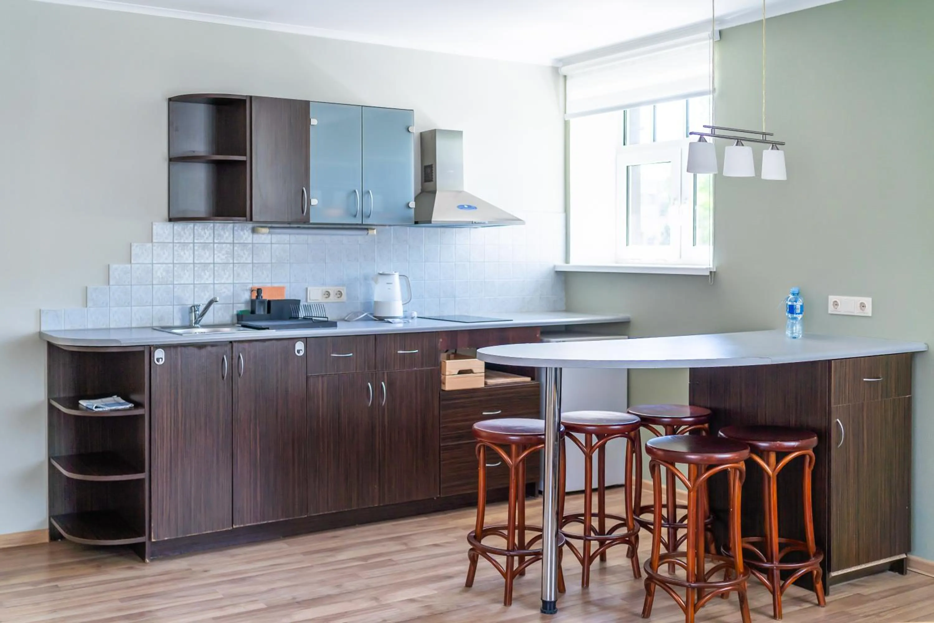 Kitchen or kitchenette in Apartamenti Kurshi