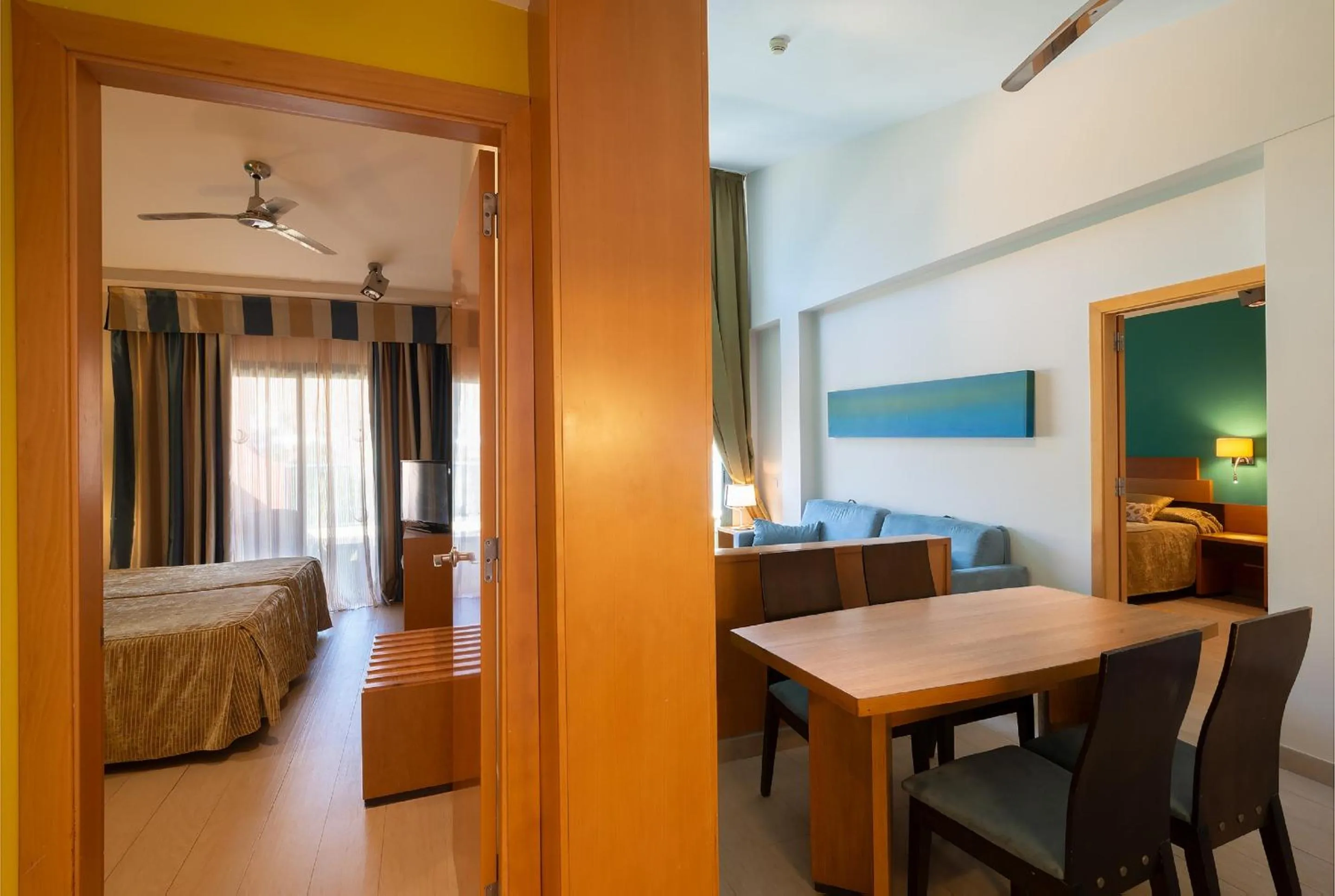 Seating area, Bed in Apartamentos Cordial Mogán Valle