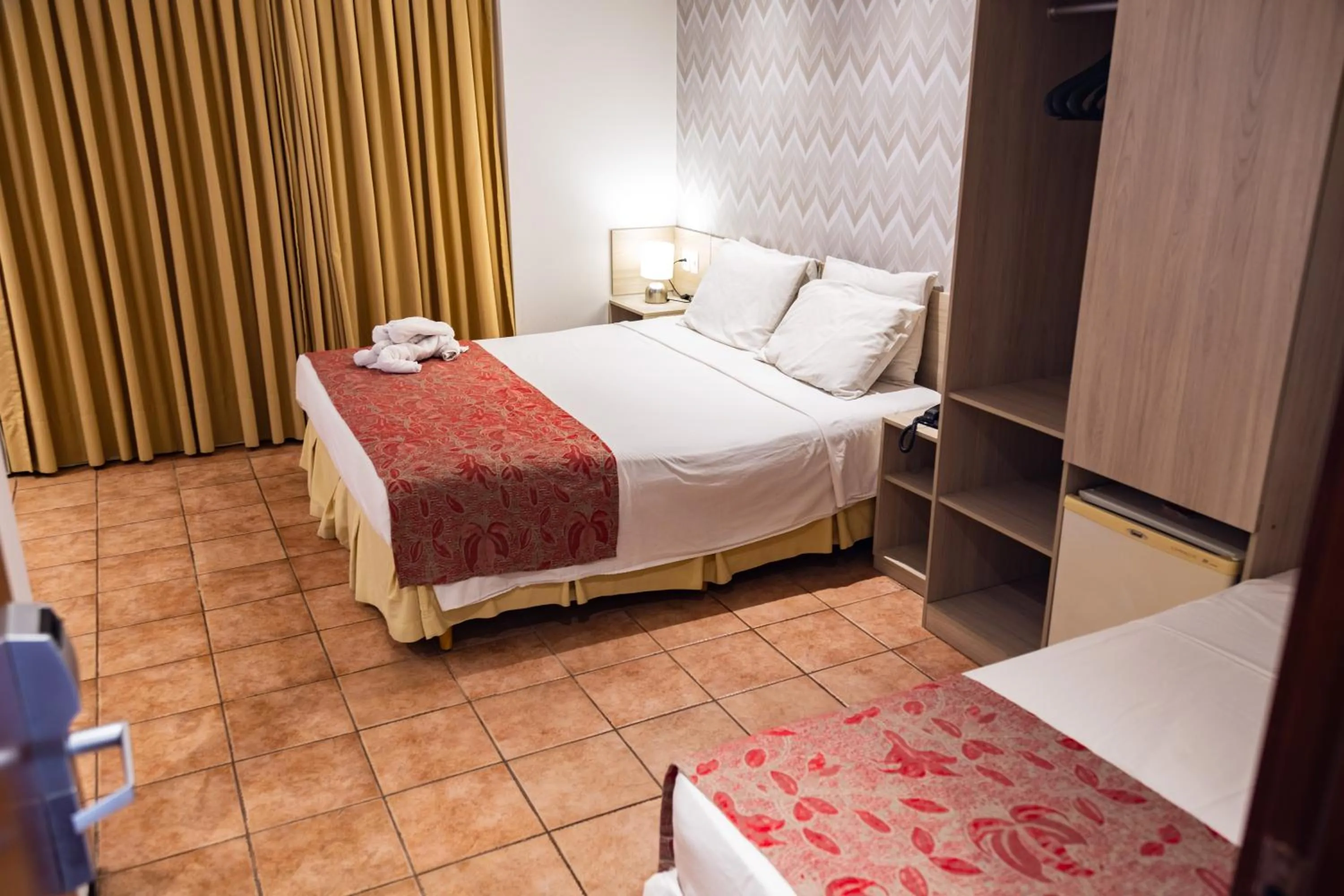 Bed in Plaza Praia Suítes