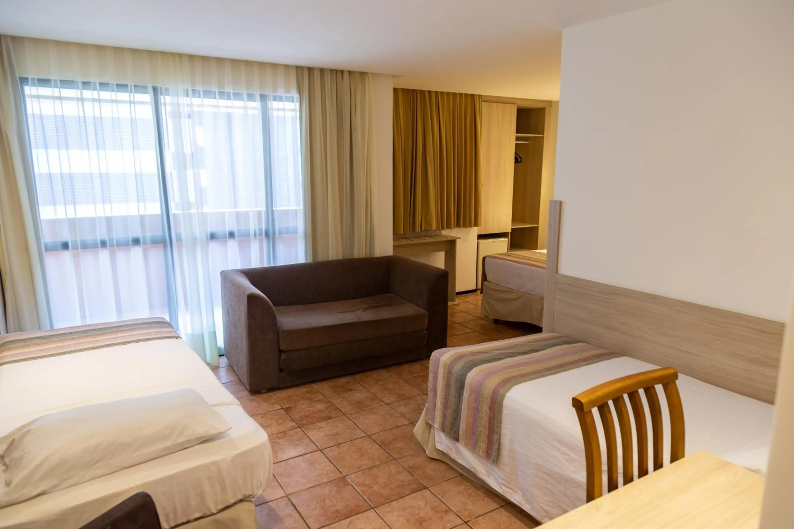 Bedroom, Bed in Plaza Praia Suítes