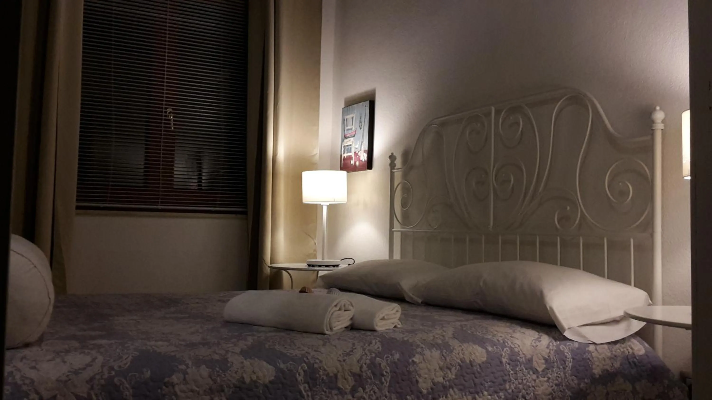 Photo of the whole room, Bed in La Casa di Nina