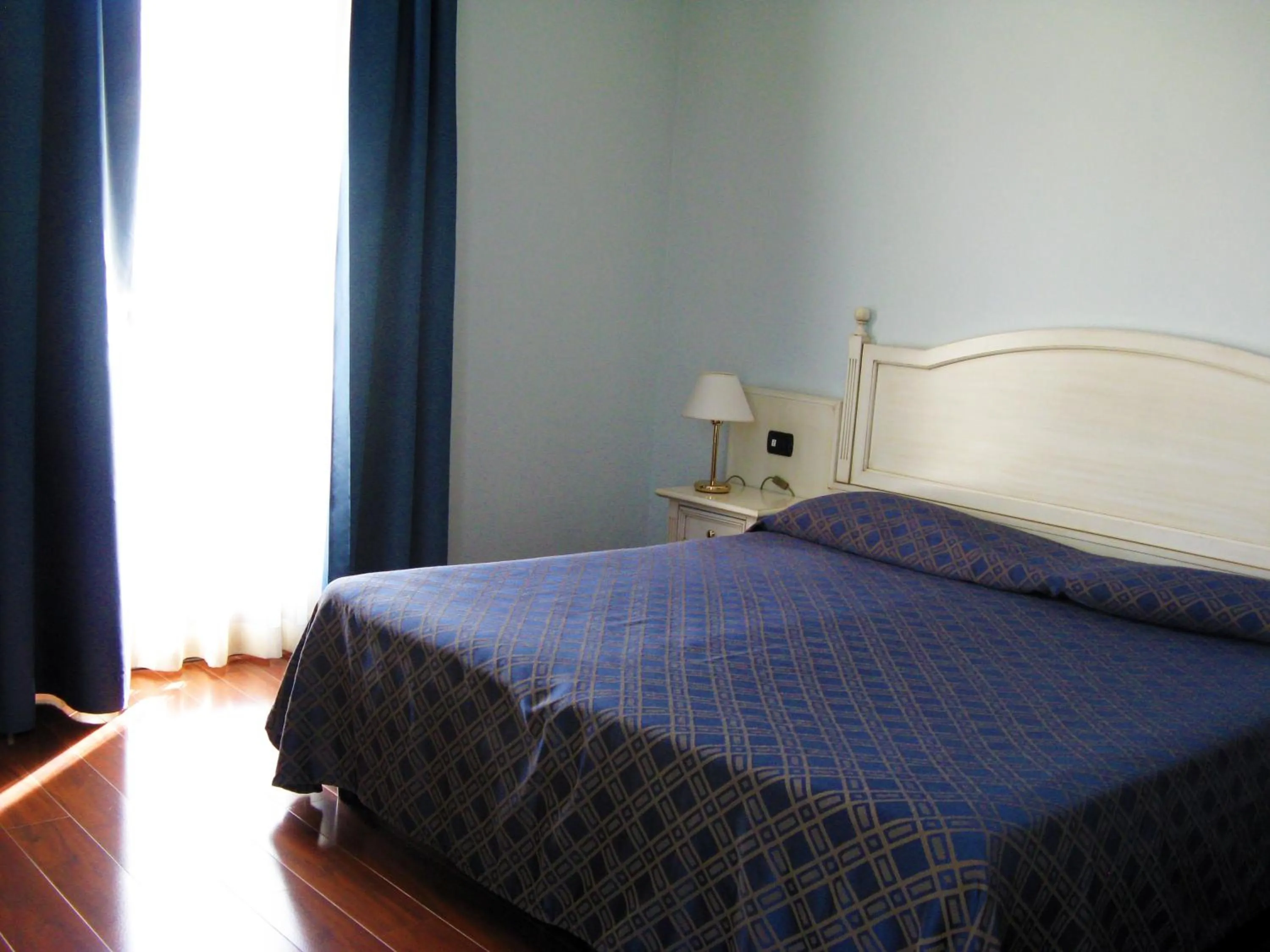 Photo of the whole room, Bed in International Hotel