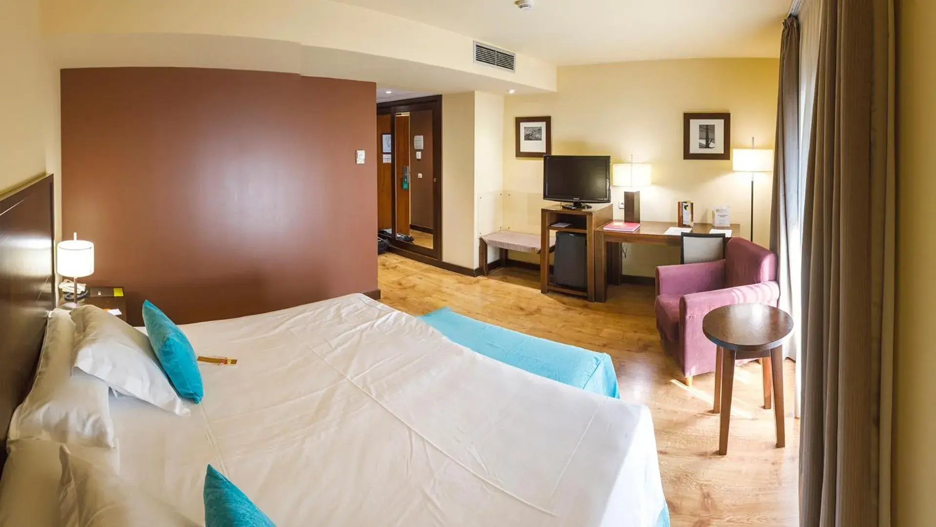 Photo of the whole room, Bed in Gran Hotel Ciudad de Barbastro Photo of the whole room, Bed in Gran Hotel Ciudad de Barbastro