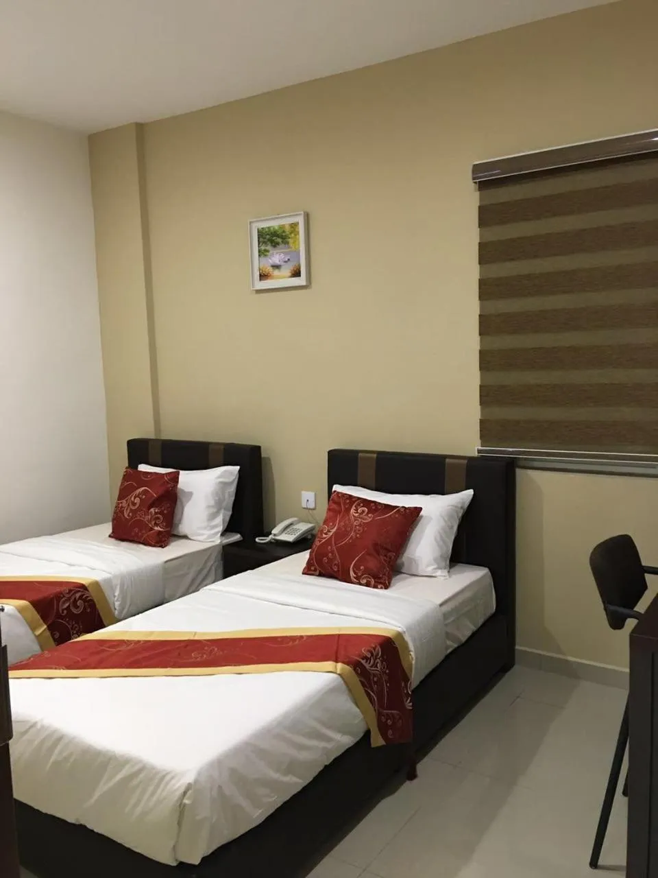 Bed in Global Inn Hotel