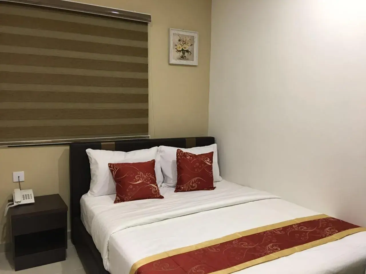 Bed in Global Inn Hotel Bed in Global Inn Hotel