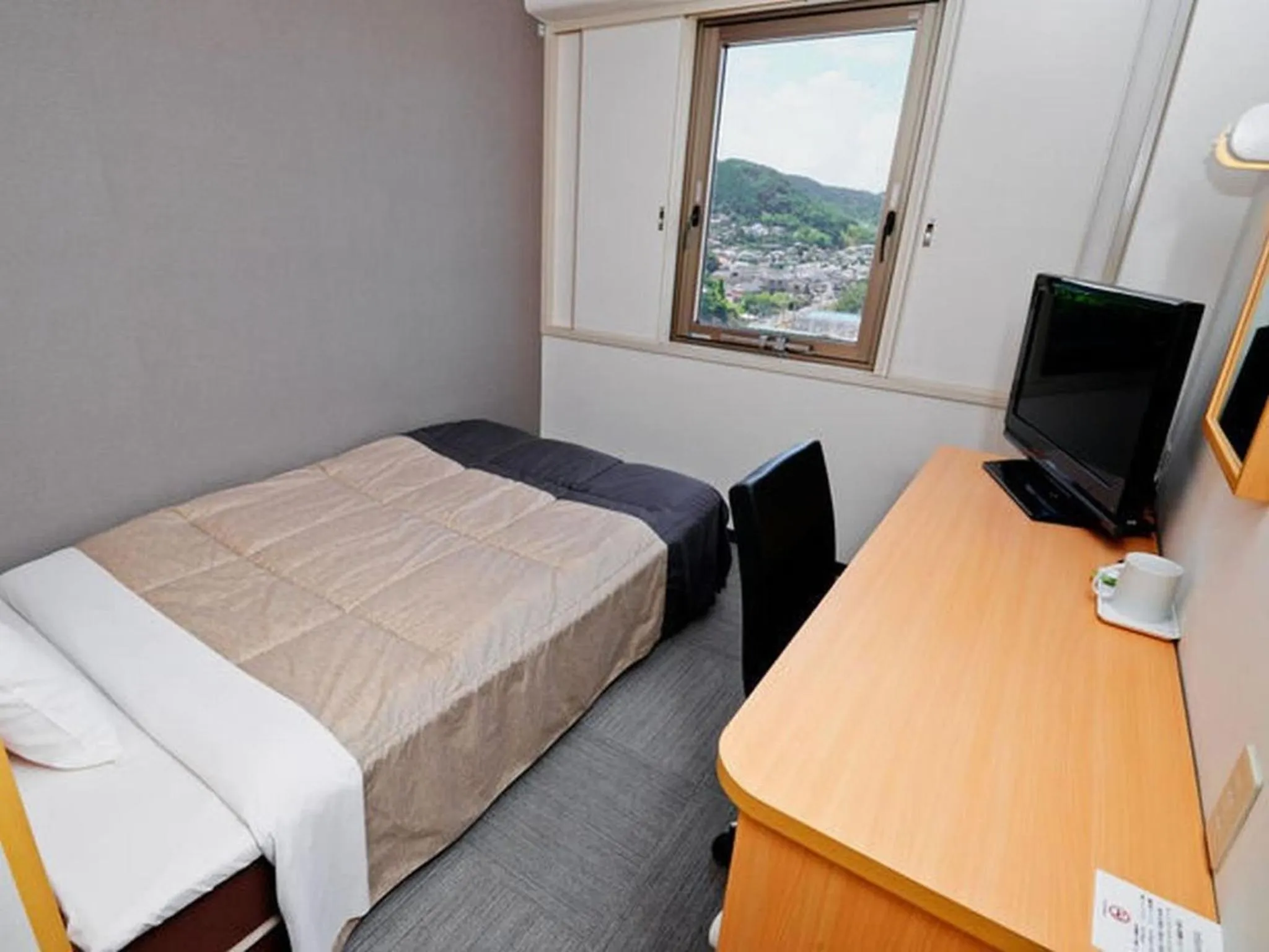 Photo of the whole room, Bed in Super Hotel Minamata