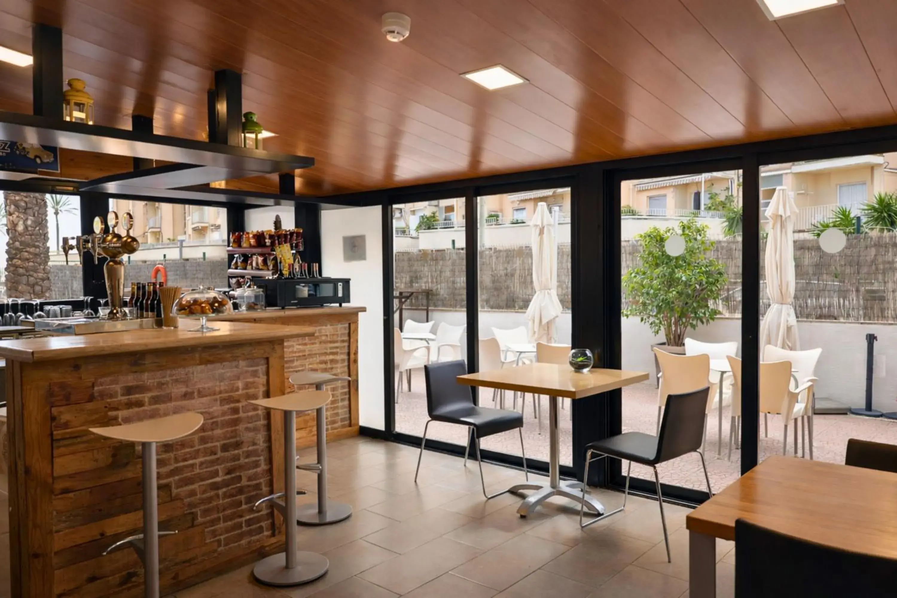 Lounge or bar in Adia Hotel Cunit Playa Lounge or bar in Adia Hotel Cunit Playa