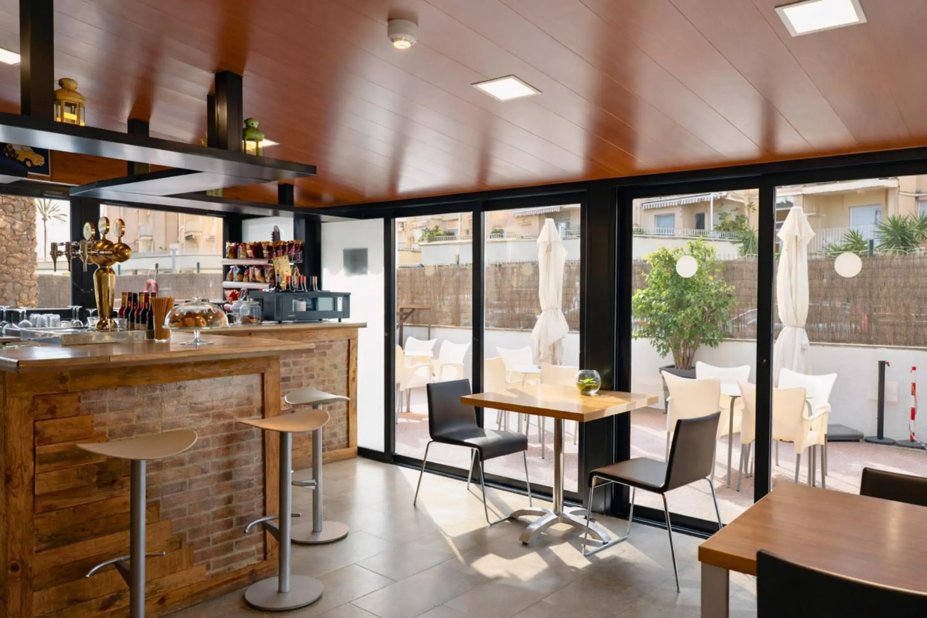 Lounge or bar in Adia Hotel Cunit Playa Lounge or bar in Adia Hotel Cunit Playa