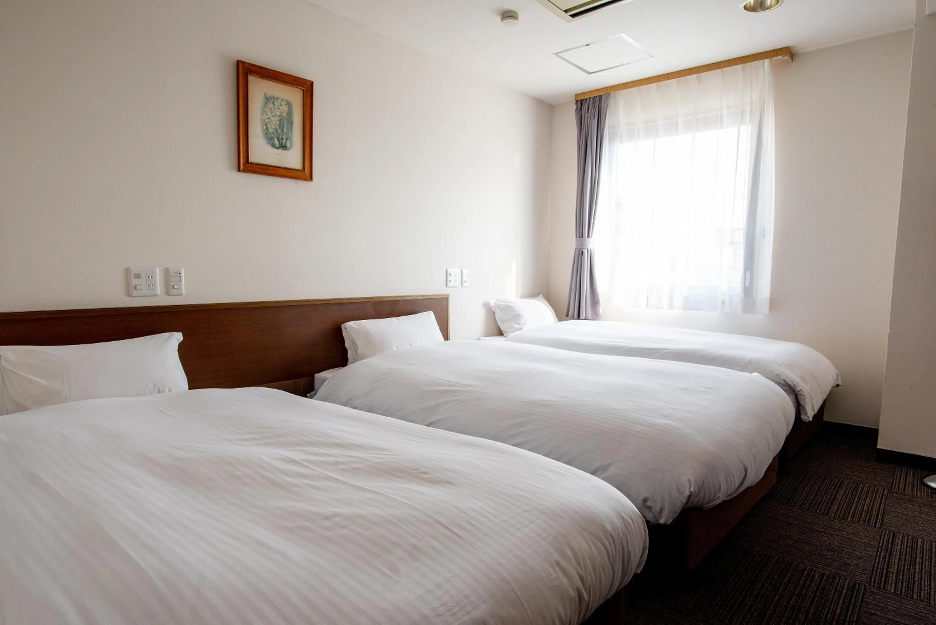 Bed in 小牧シティホテル