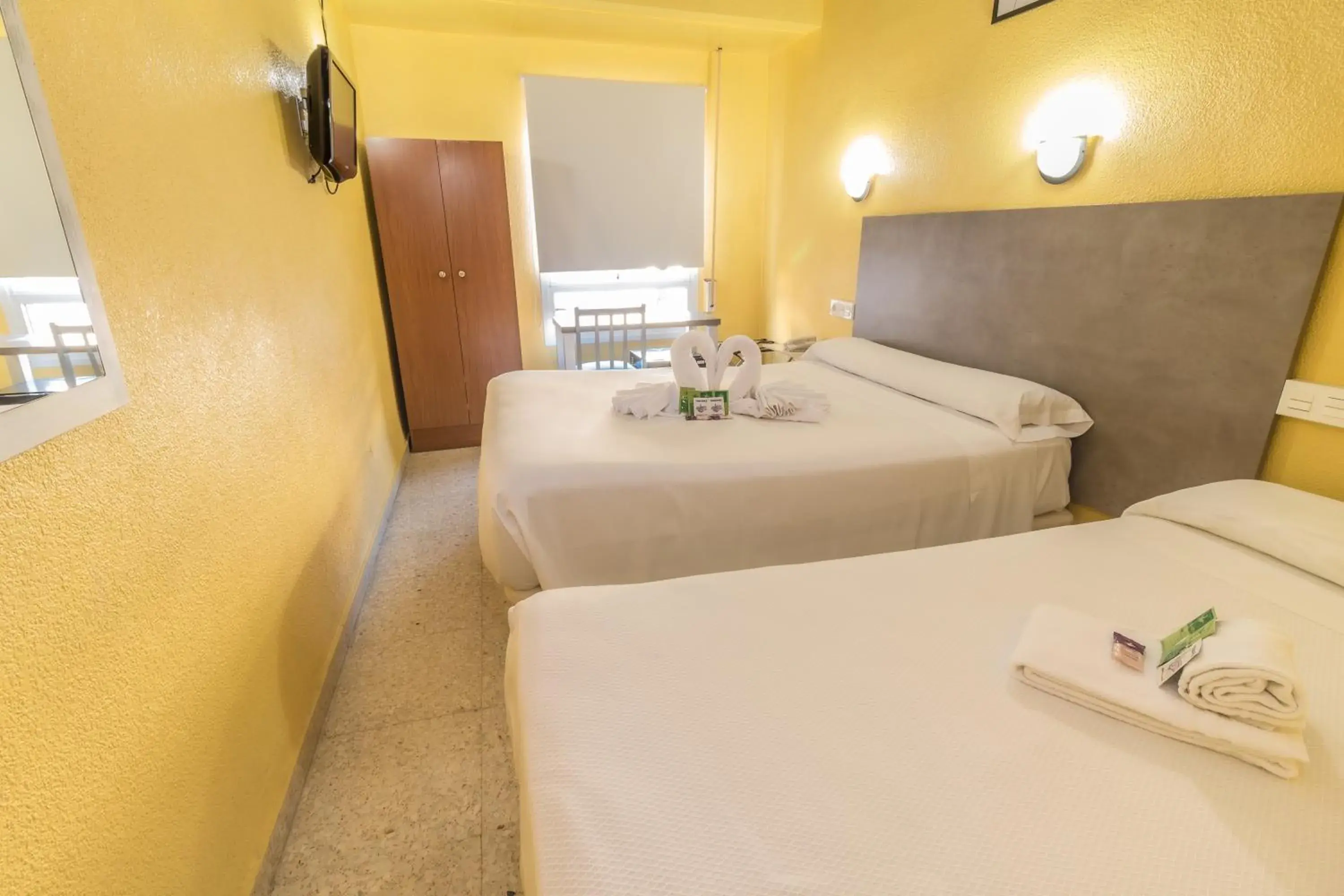Classic Triple Room in Hotel Universal Murcia Classic Triple Room in Hotel Universal Murcia