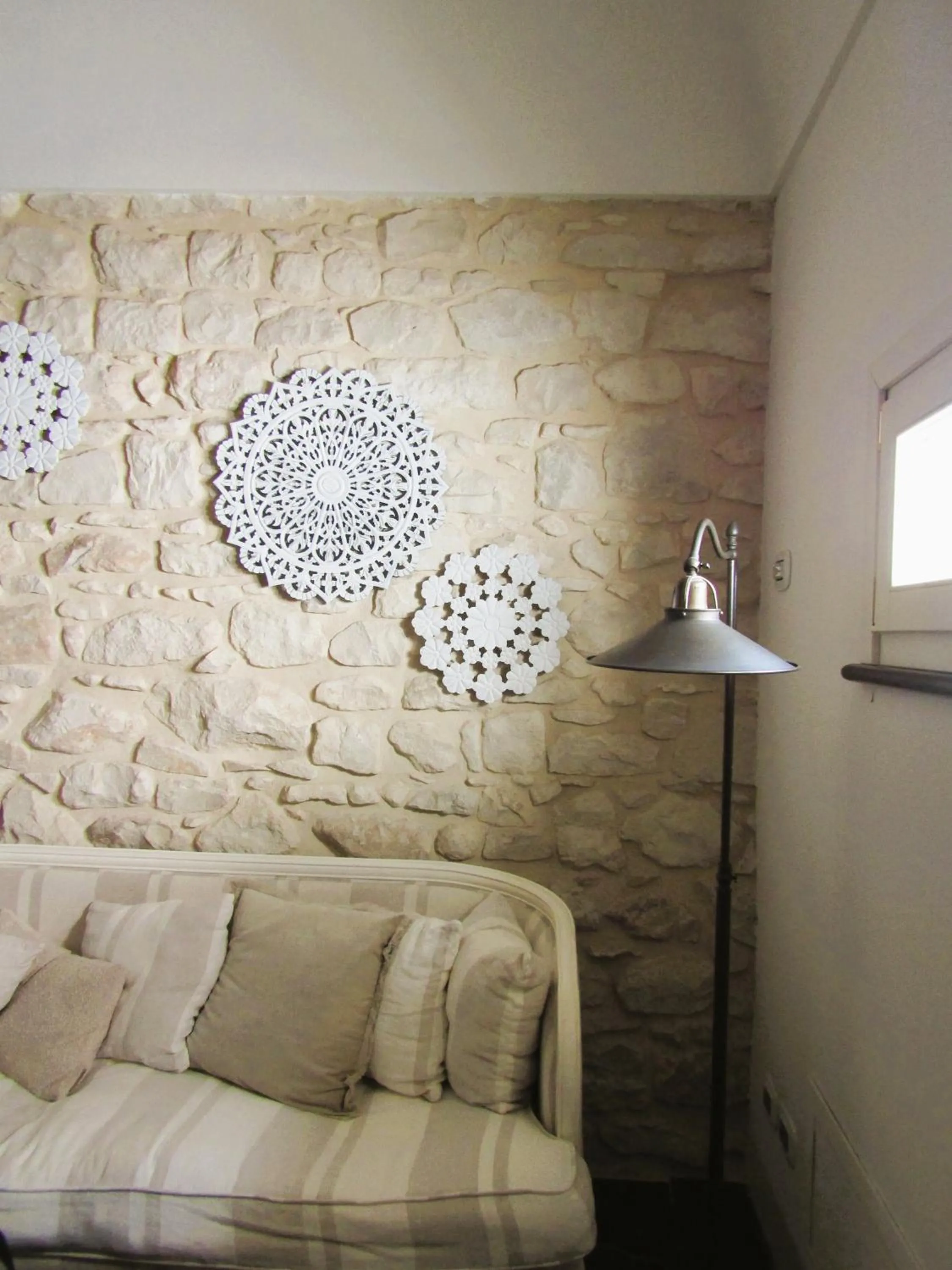 Communal lounge/ TV room in Palazzo Conti Camere & Suites