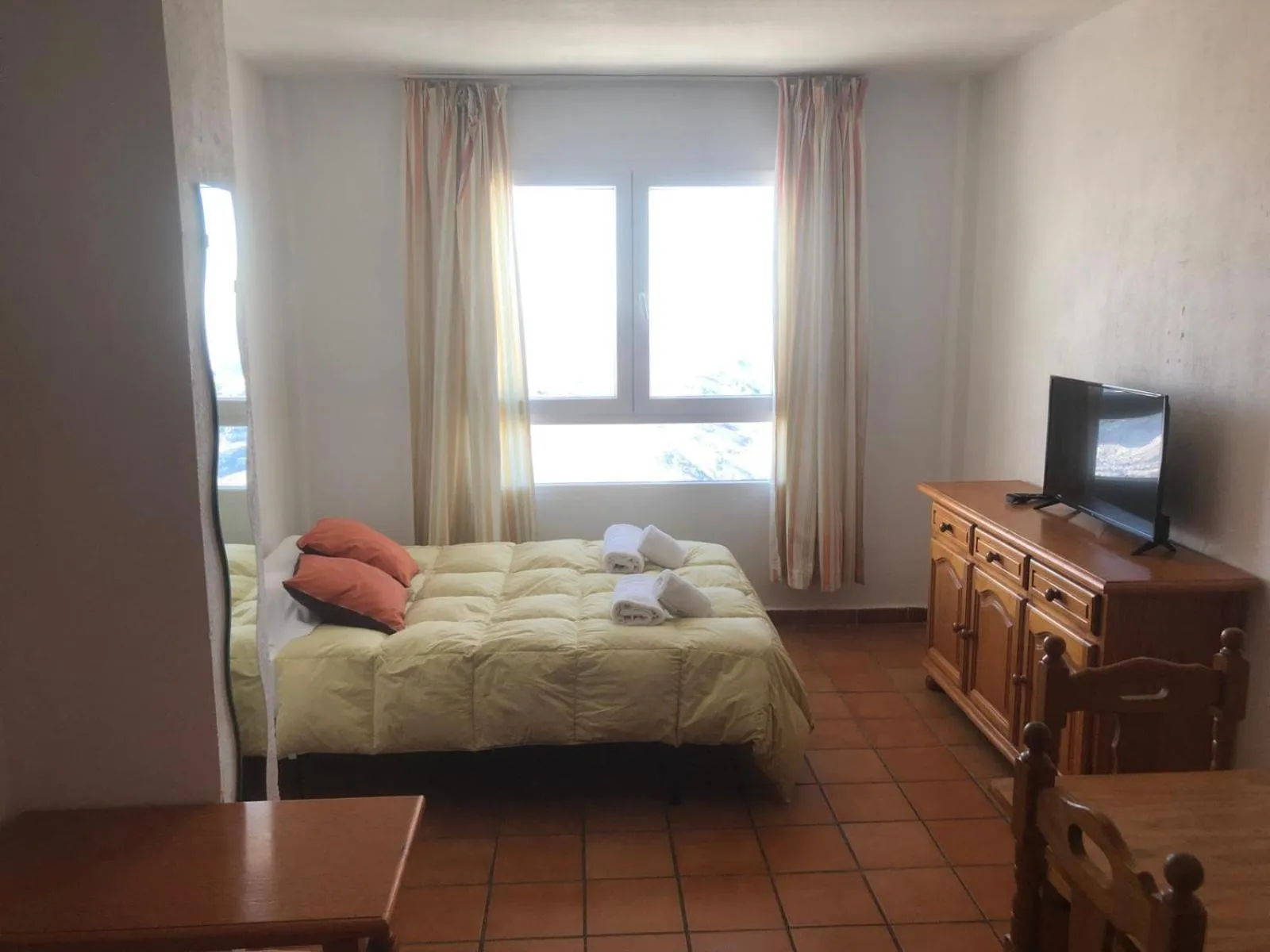 Photo of the whole room, Bed in Apartamentos Montreal