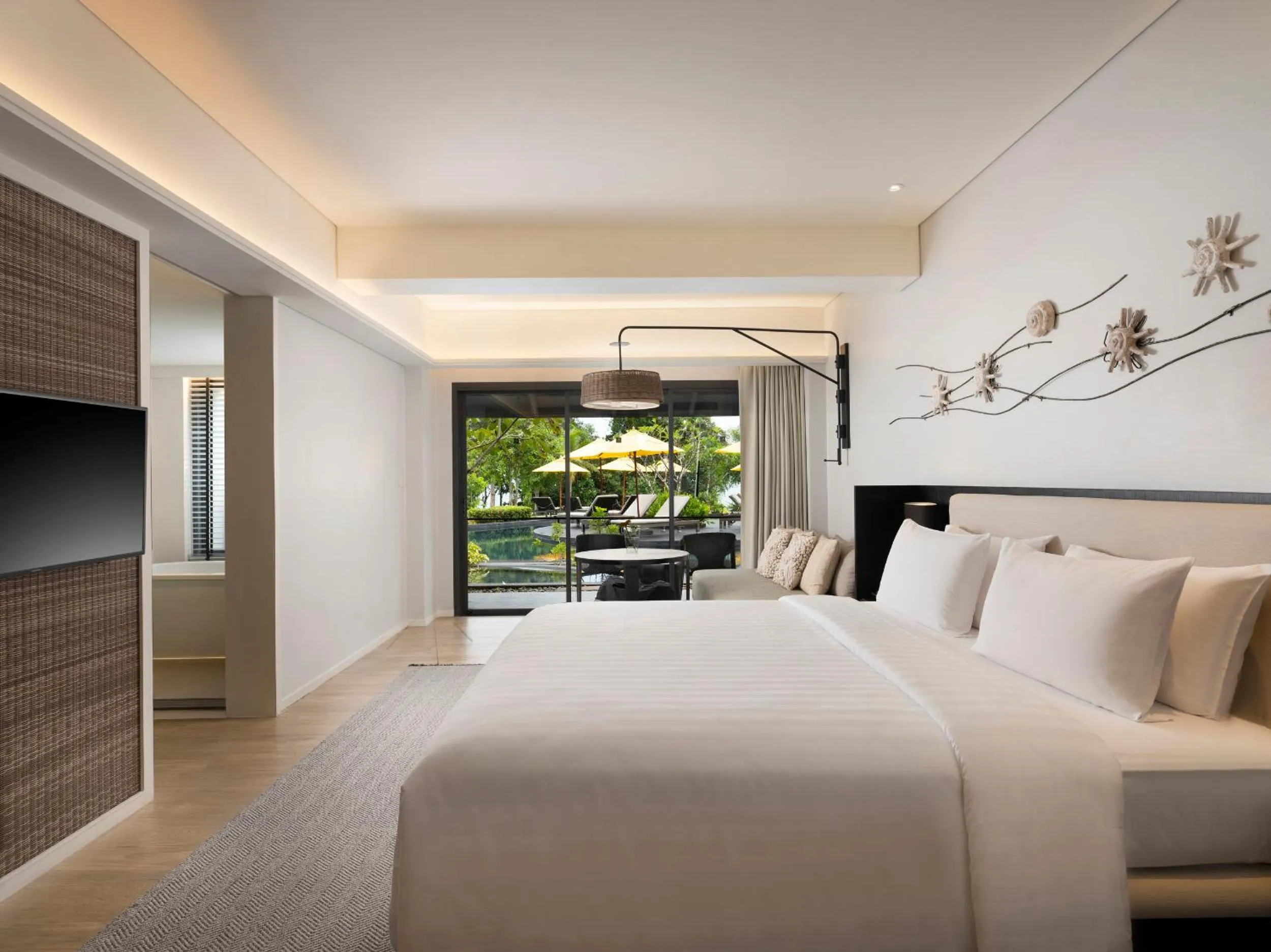 Bed in The ShellSea Krabi I Luxury Beach Front Resort & Pool Villa