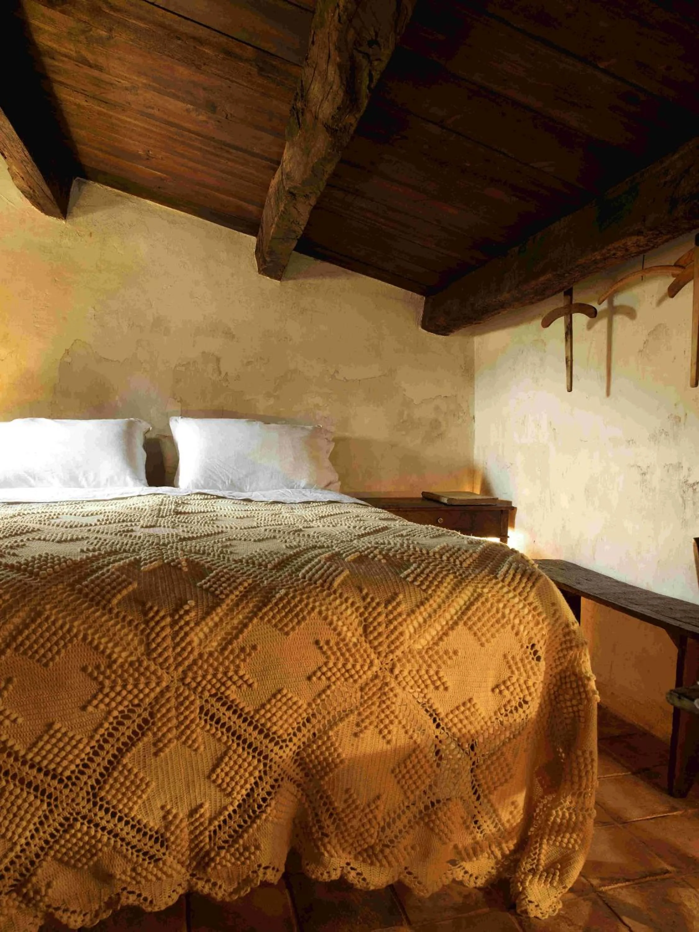 Bed in Sextantio Albergo Diffuso