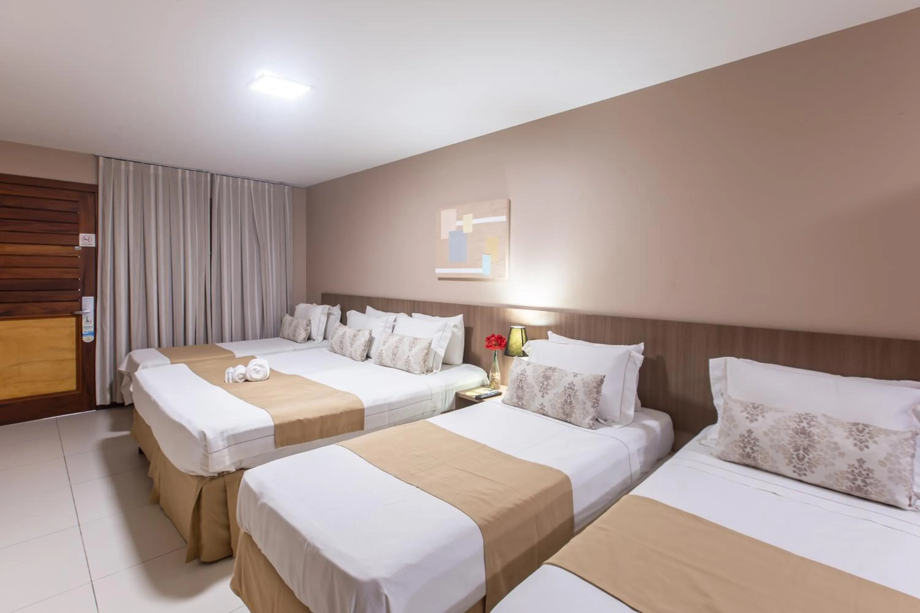 Bed in Amuarama Hotel