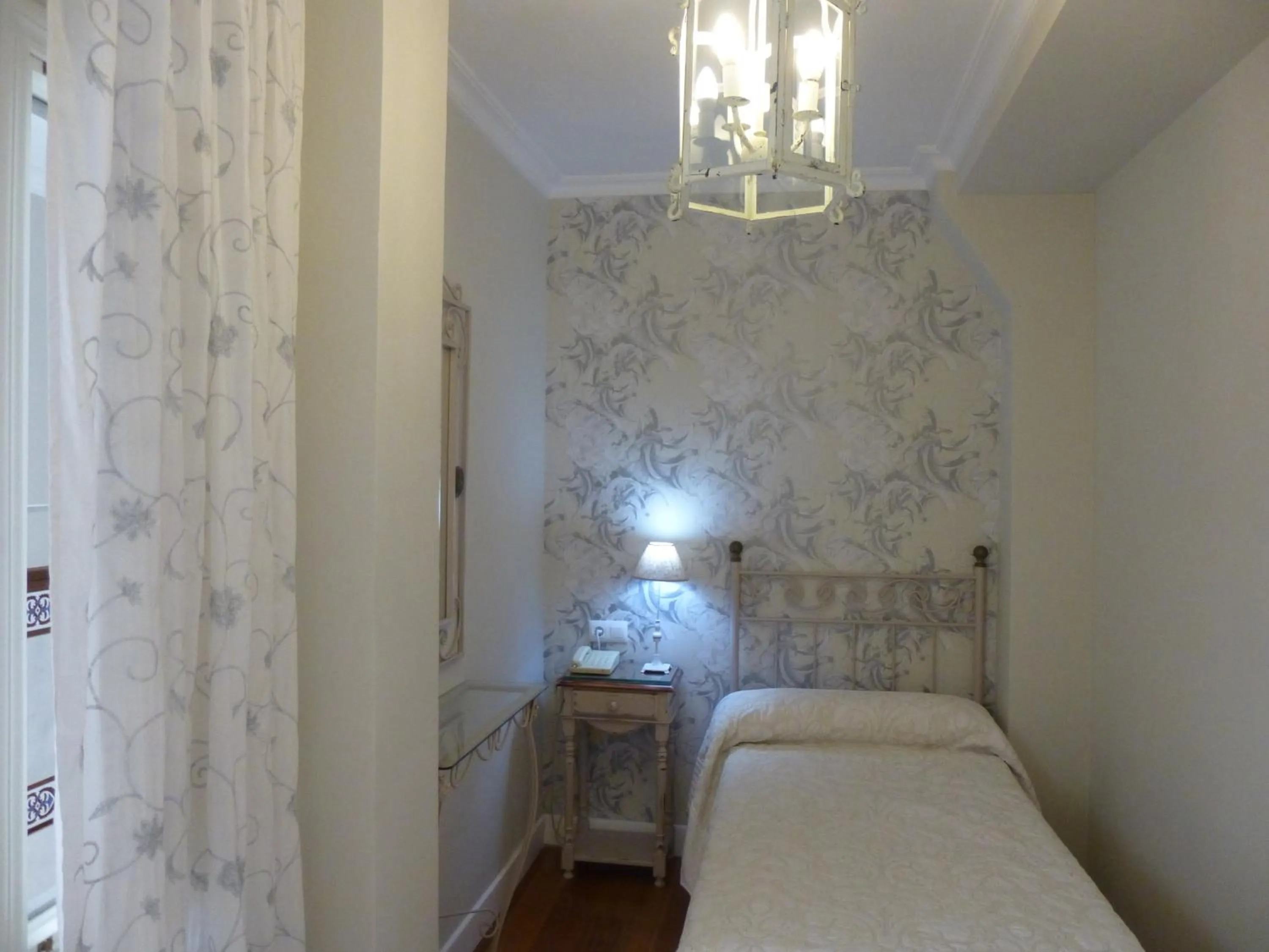 Photo of the whole room, Bed in Le Petit Paris