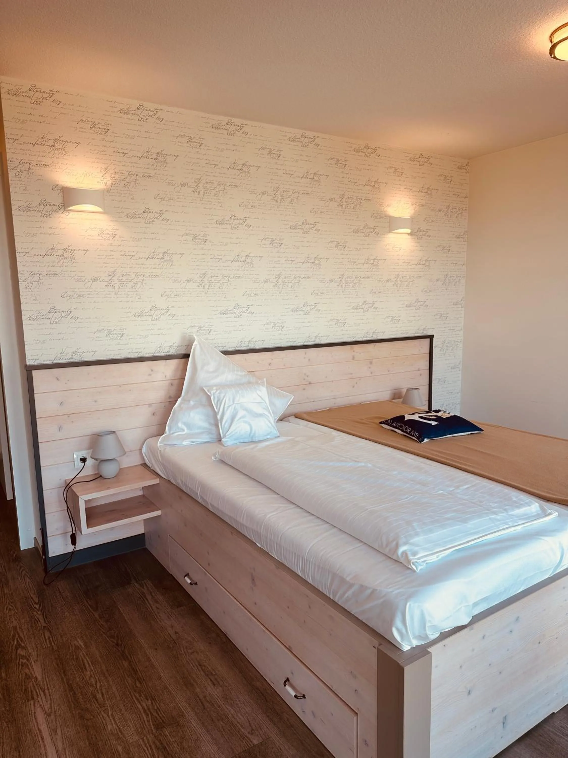 Bed in Kanal-Haus "Das Gästehaus direkt am NOK"