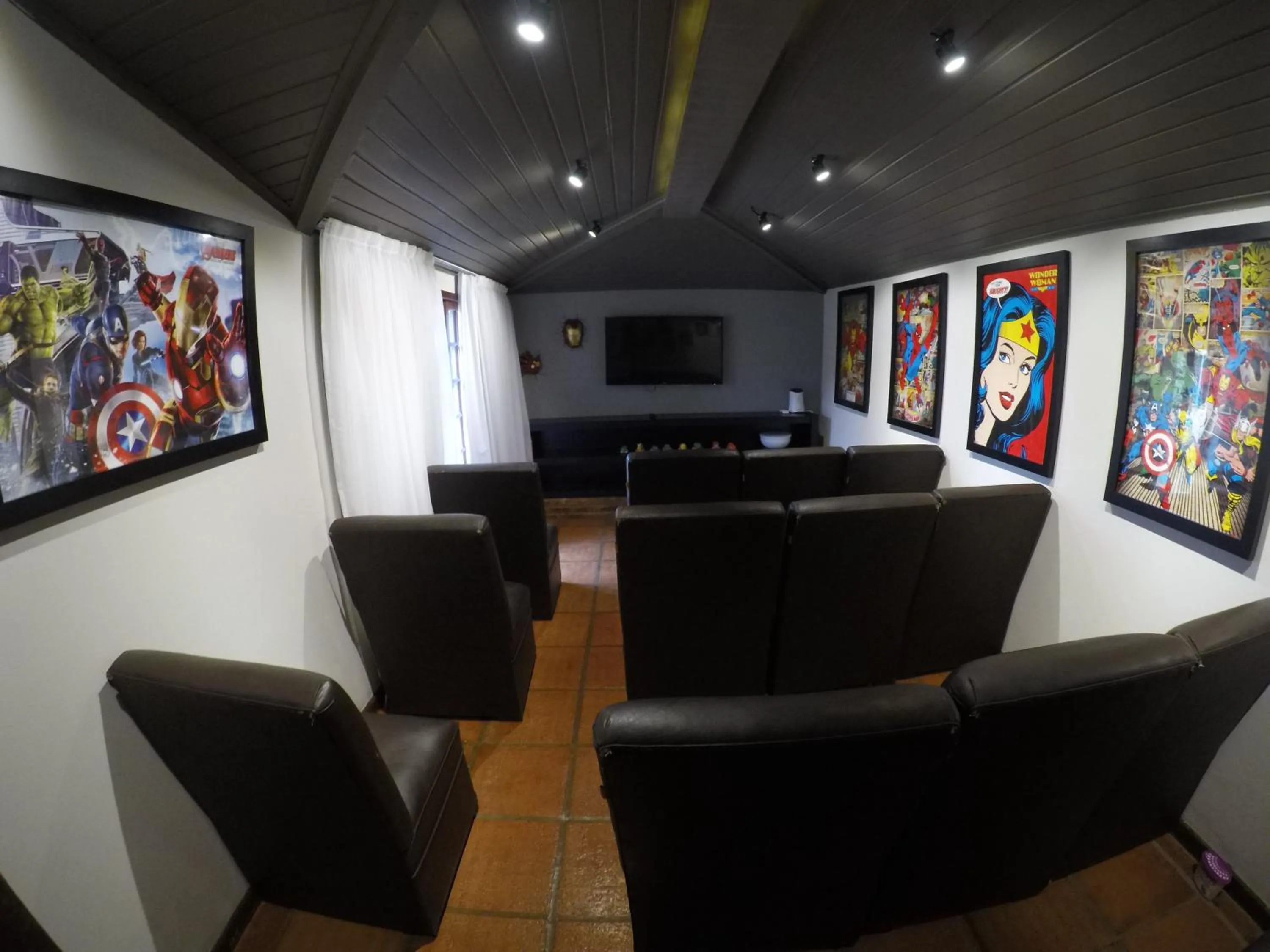 Communal lounge/ TV room in Corais e Conchas