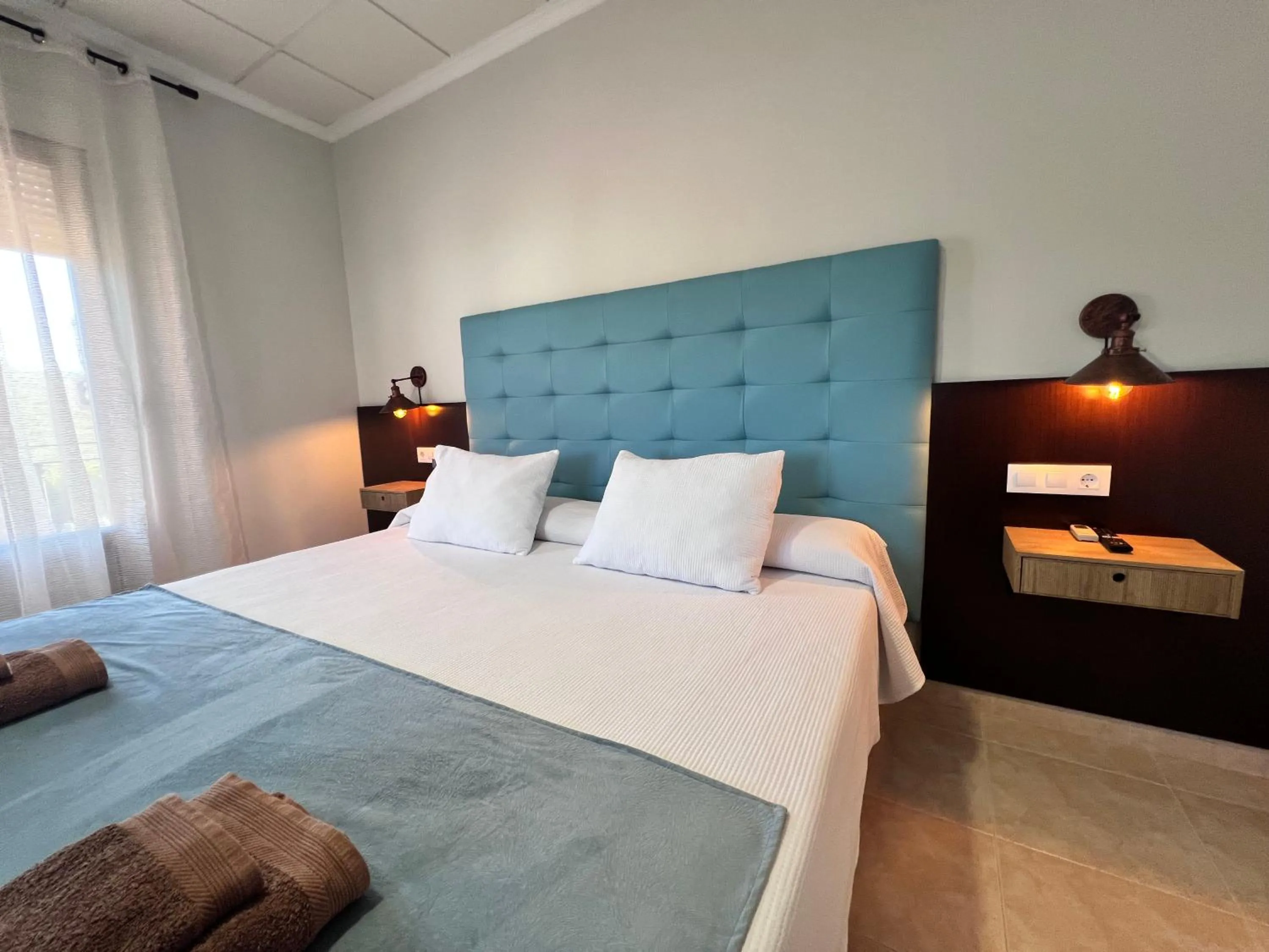 Bed in Hotel Don Juan