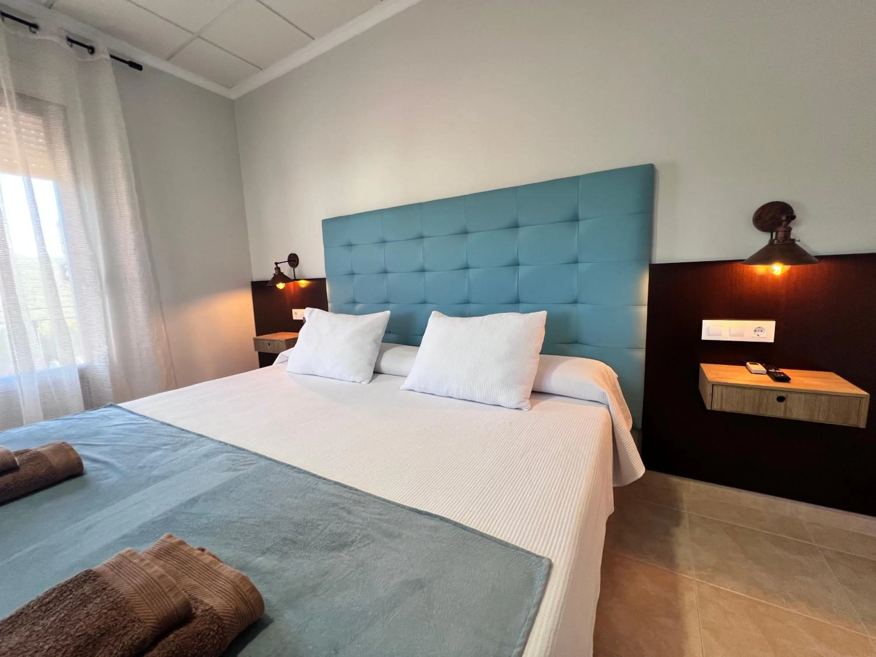 Bed in Hotel Don Juan