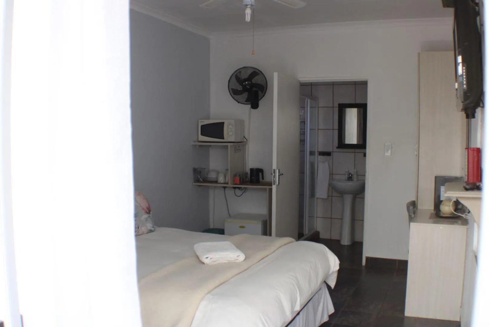 Bed in Ukarimu Guest House