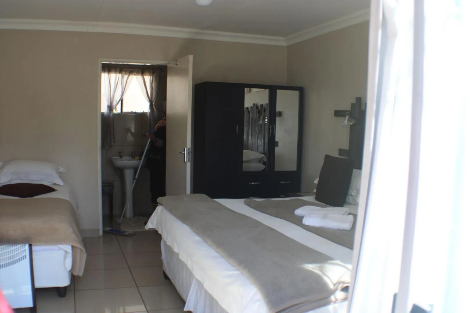 Bed in Ukarimu Guest House