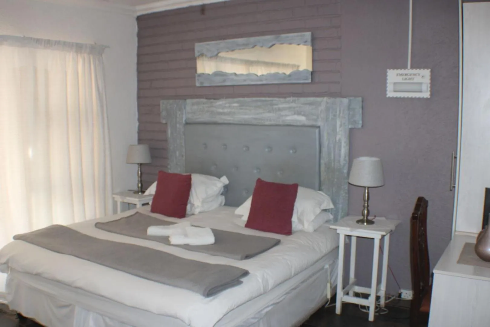 Bed in Ukarimu Guest House