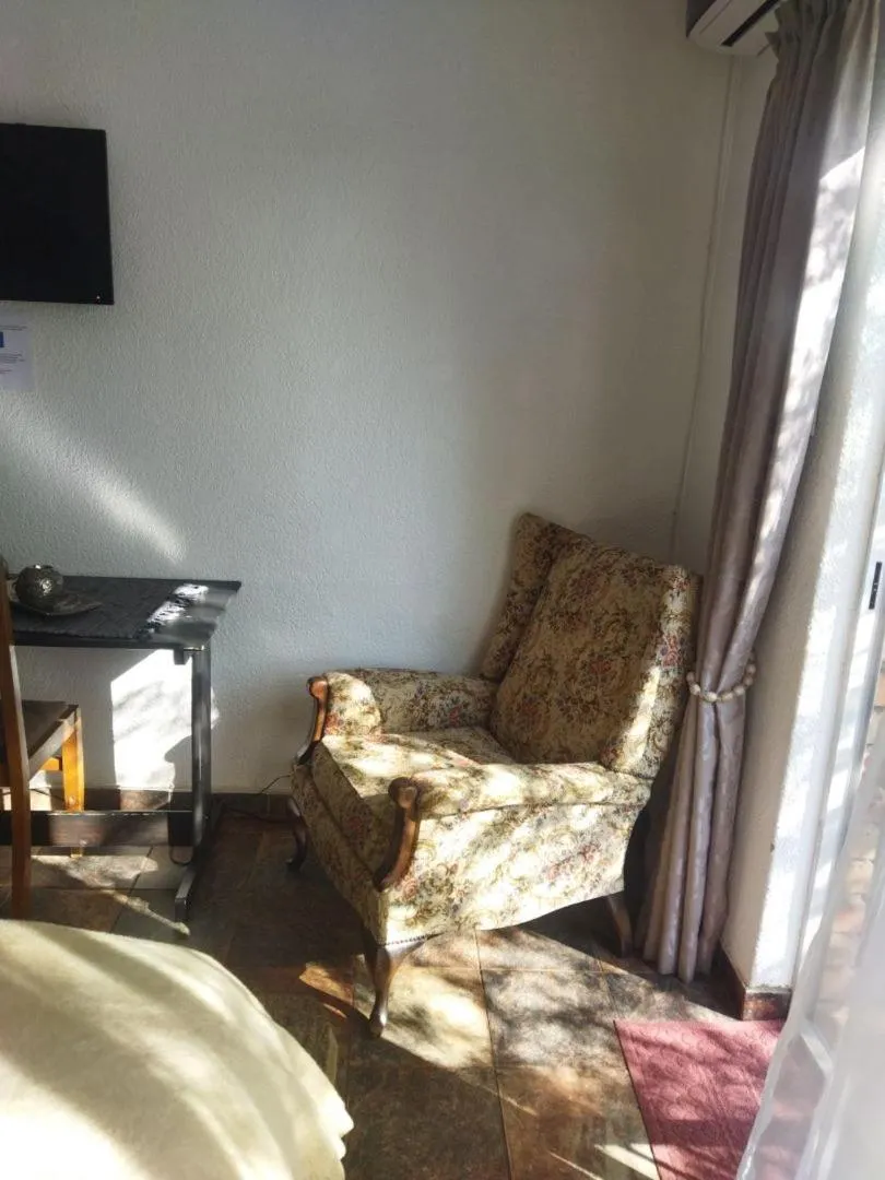 Bed in Ukarimu Guest House