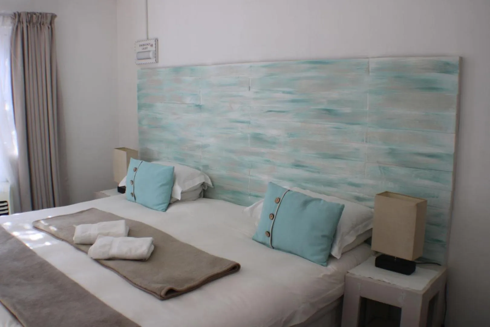 Bed in Ukarimu Guest House