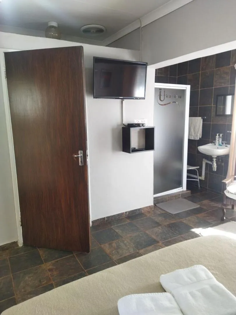 Bed in Ukarimu Guest House