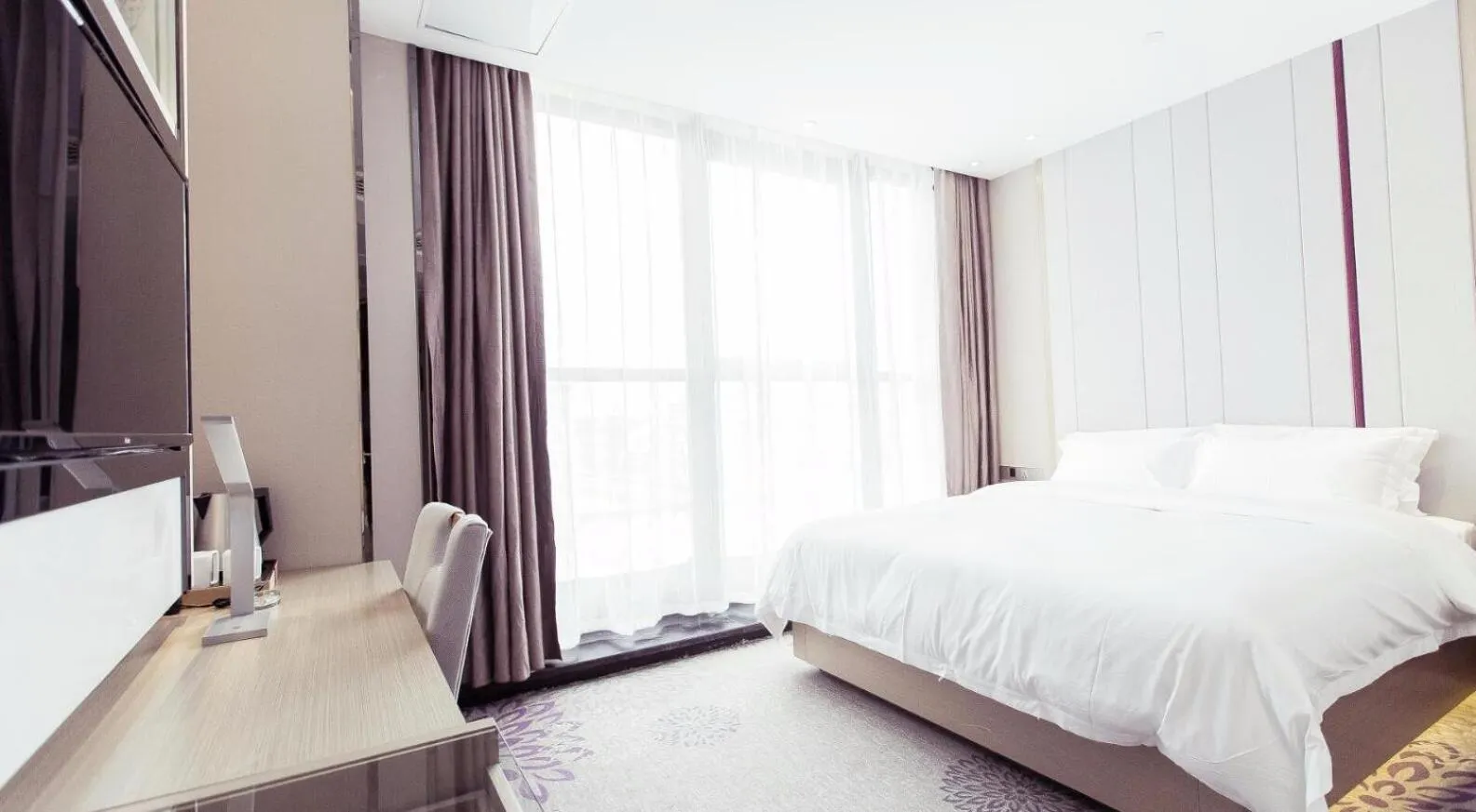 Bed in Lavande Hotel Suzhou Guanqian