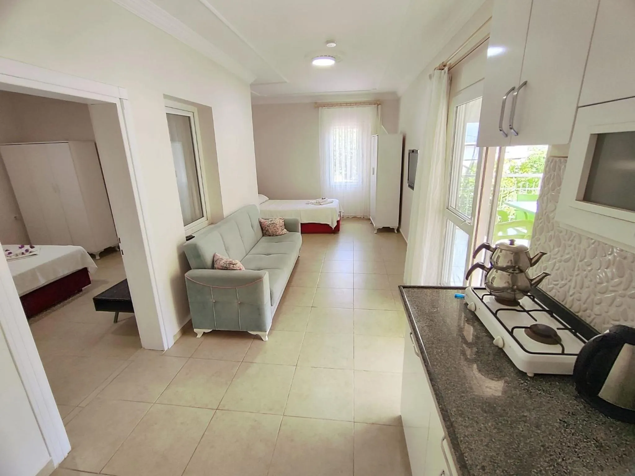 Living room, Bed in Bucak Apart Hotel Göcek & Beach