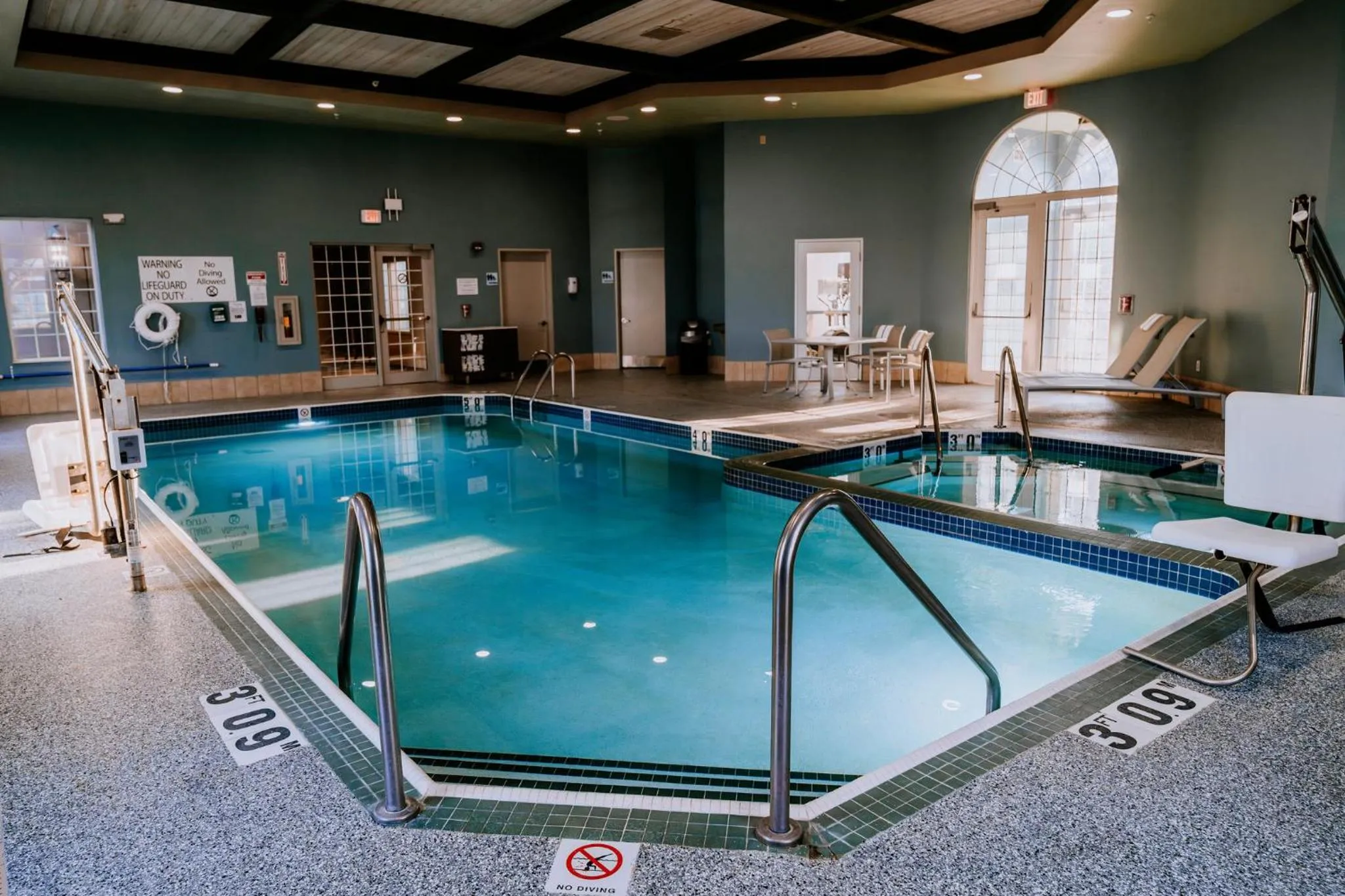 Swimming pool in Holiday Inn Express Hotel & Suites Oshkosh - State Route 41 by IHG